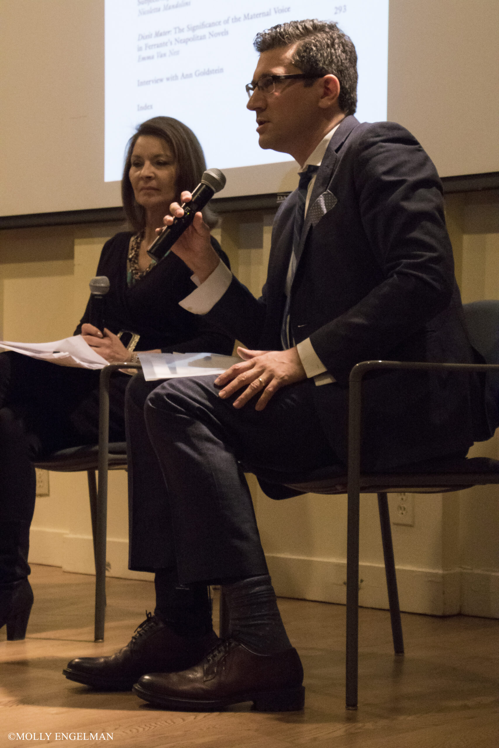 speaker-talking-from-book-presentation-at-casa-italiana