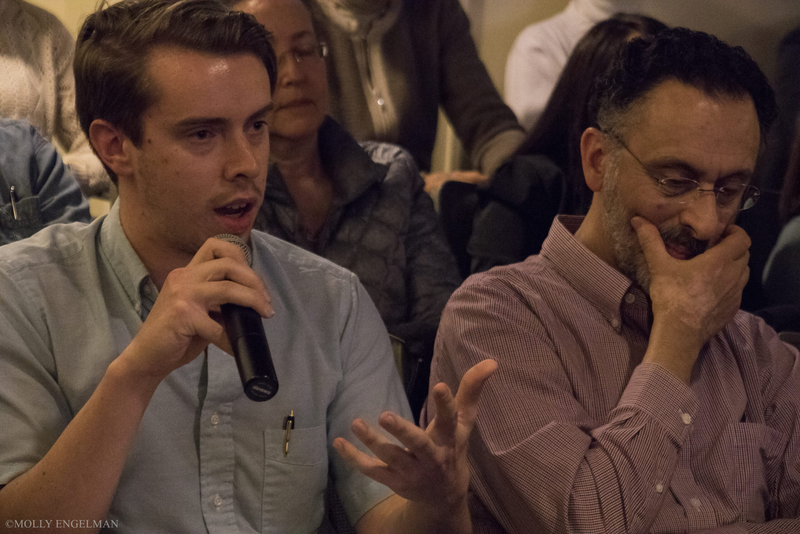 spectator-talking-from-book-presentation-at-casa-italiana