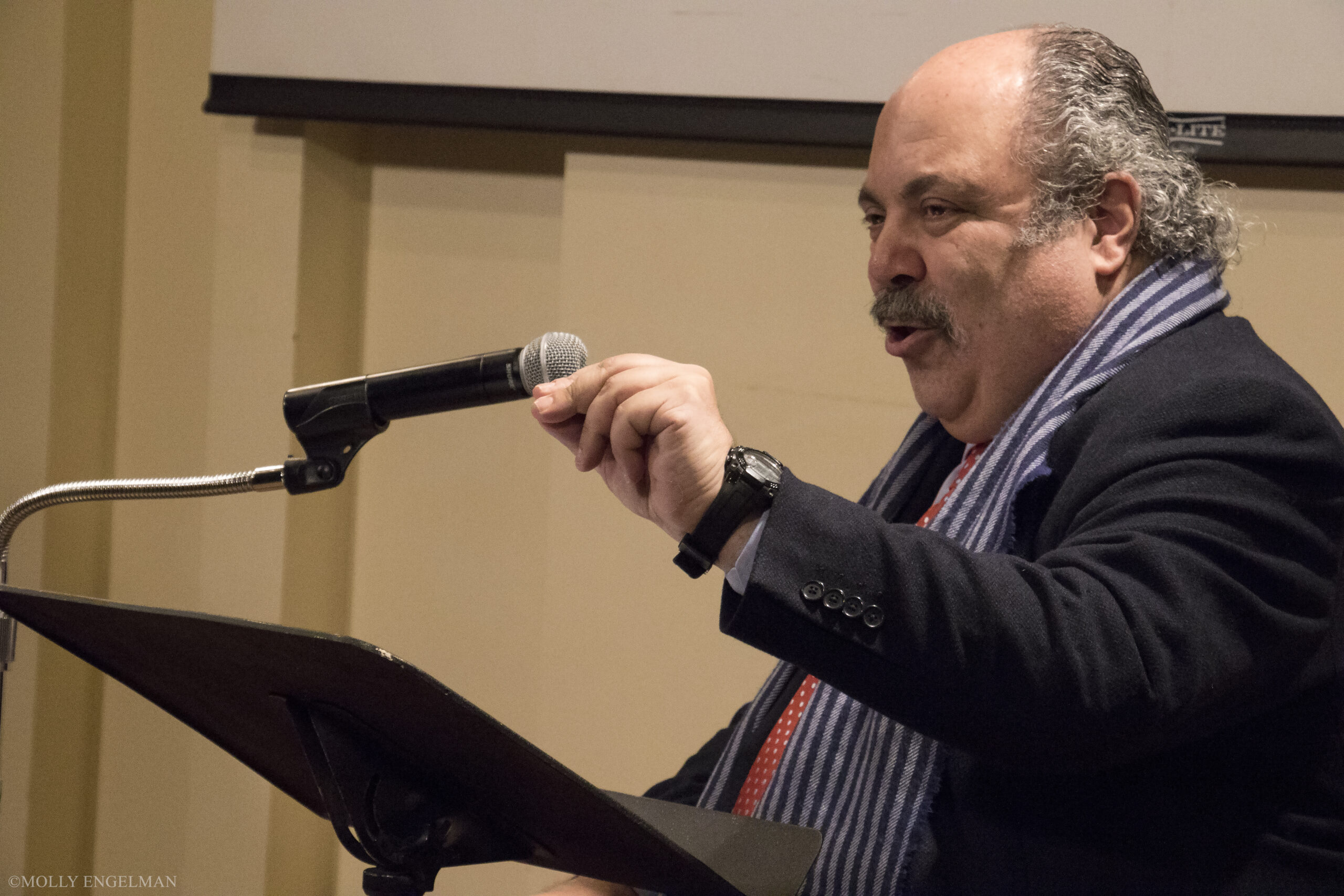 speaker-talking-from-adventures-in-italian-opera-at-casa-italiana