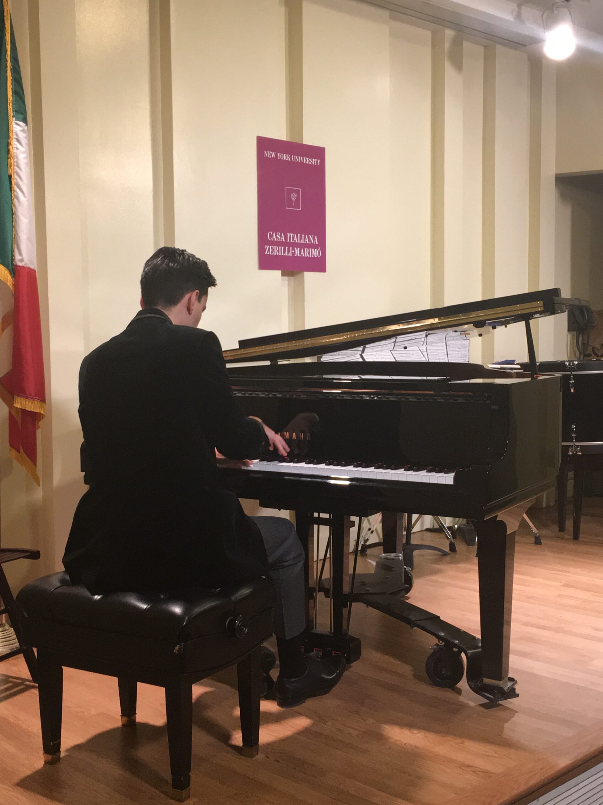 musician-playing-piano-from-concert-2017-ibla-grand-prize-at-casa-italiana