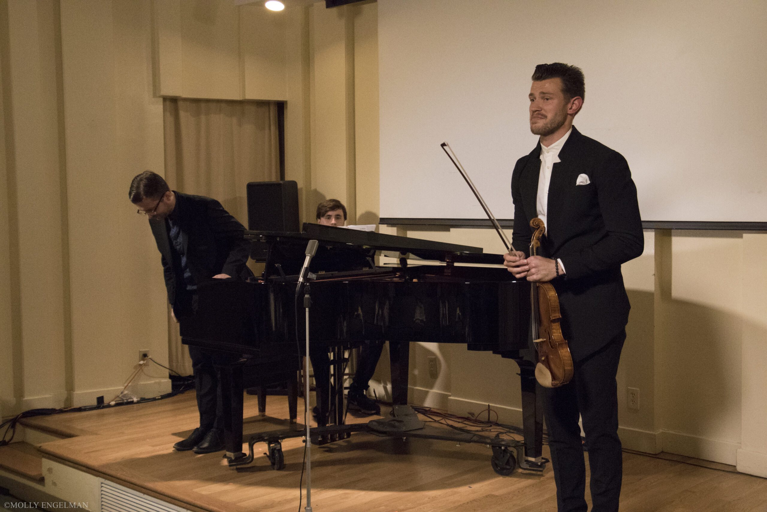 music-standing-and-bowing-down-from-chelsea-music-festival-at-casa-italiana