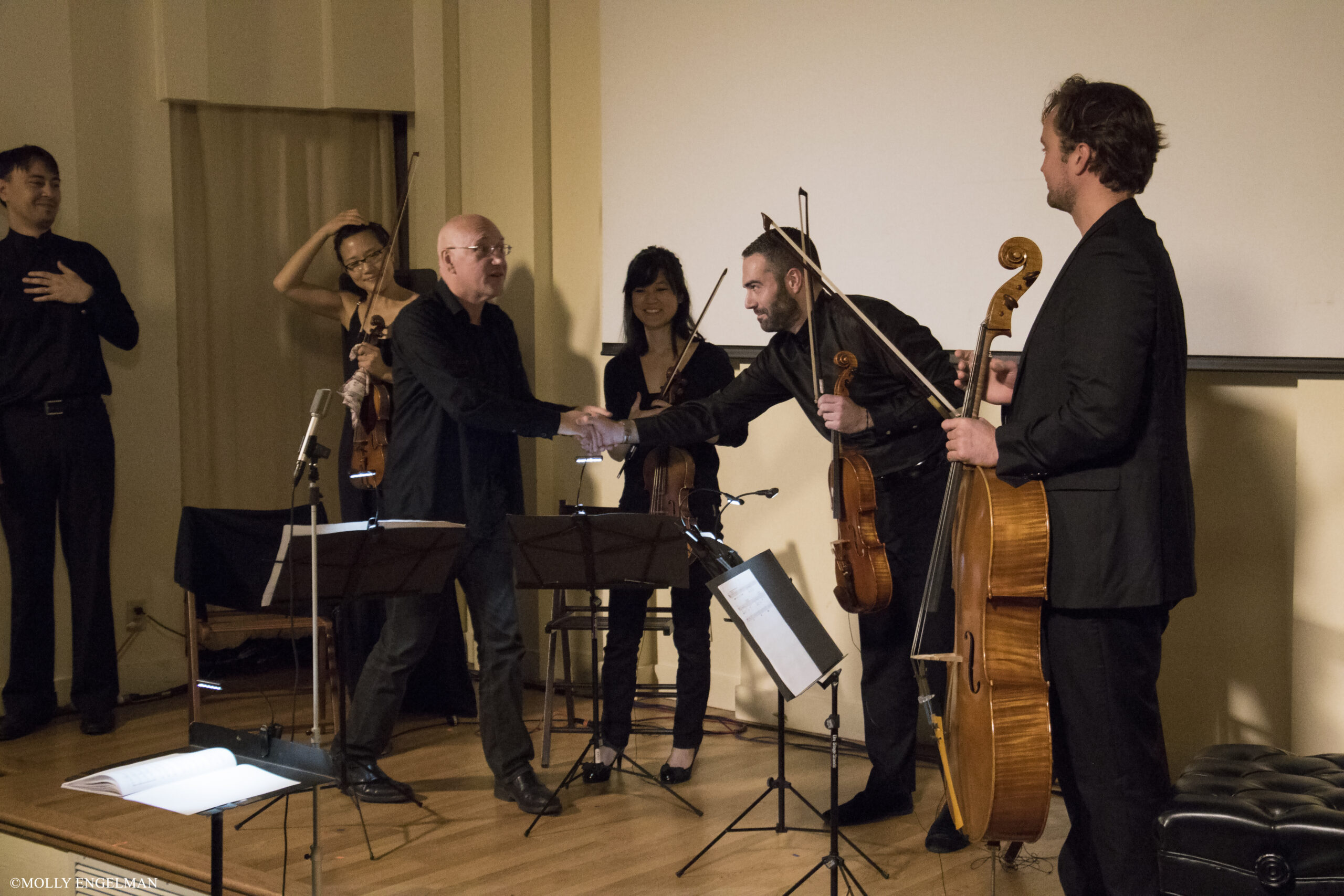 artists-shaking-hand-from-chelsea-music-festival-at-casa-italiana