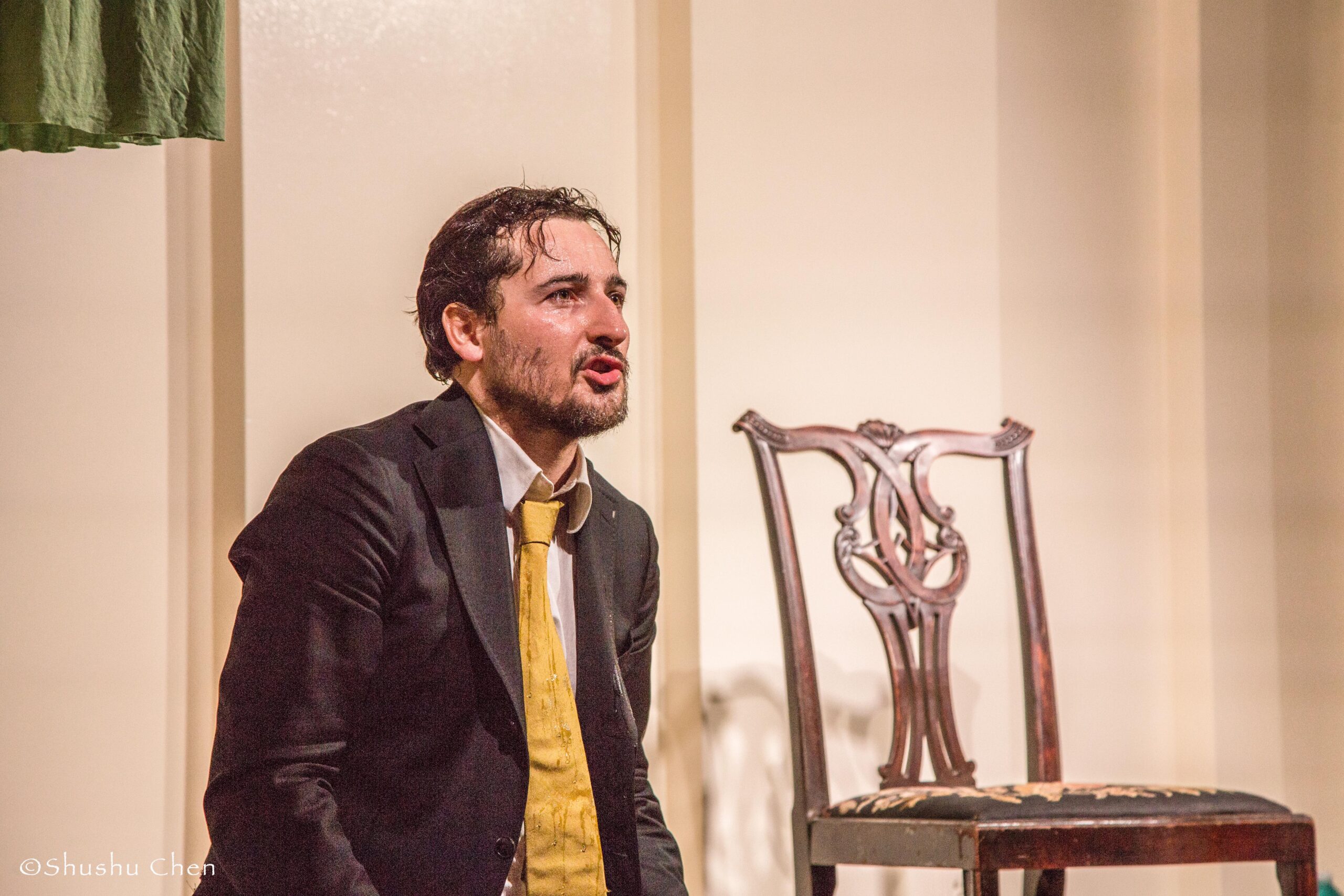 artist-performing-from-theatrical-performance-at-casa-italiana
