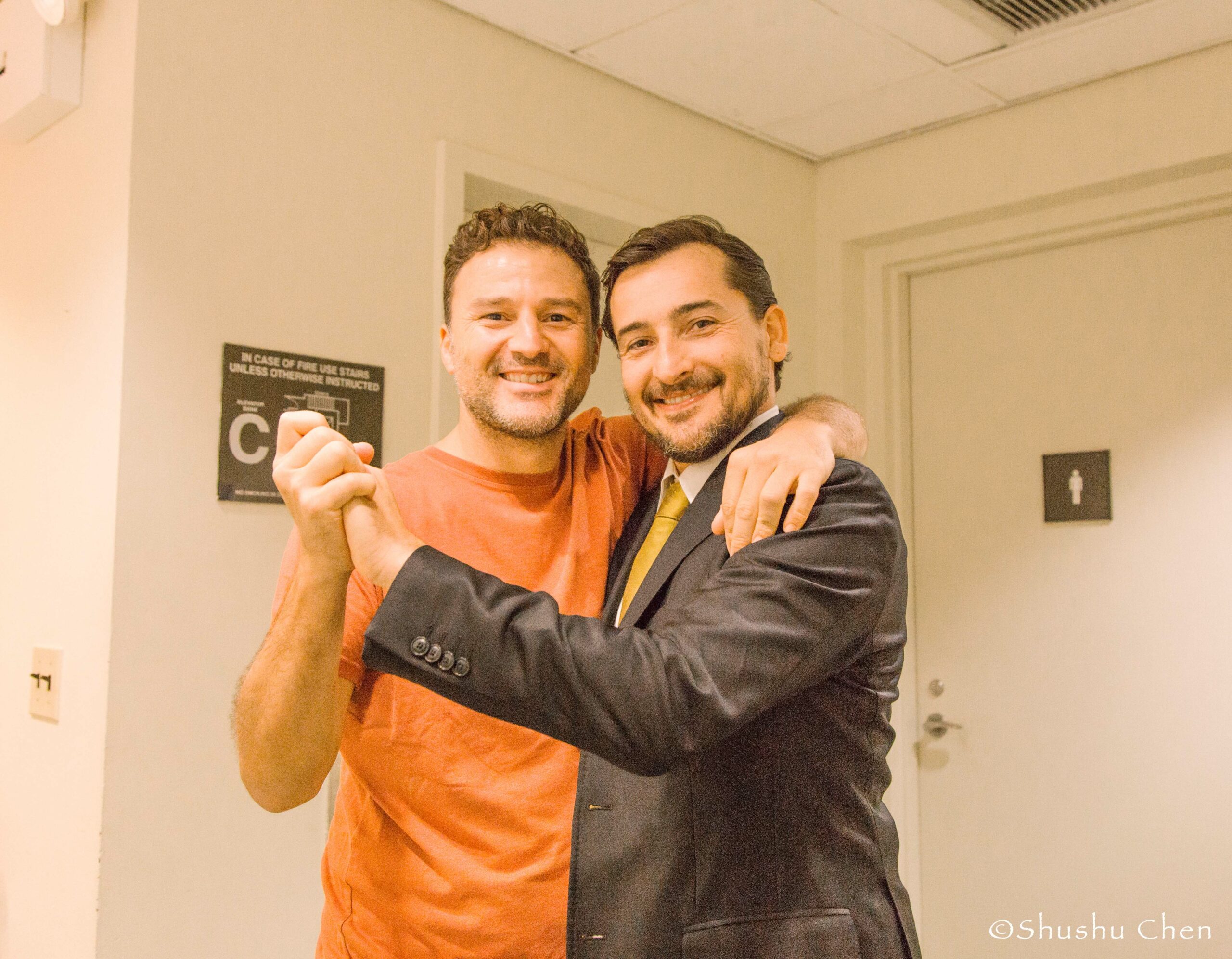 artist-with-man-from-theatrical-performance-at-casa-italiana