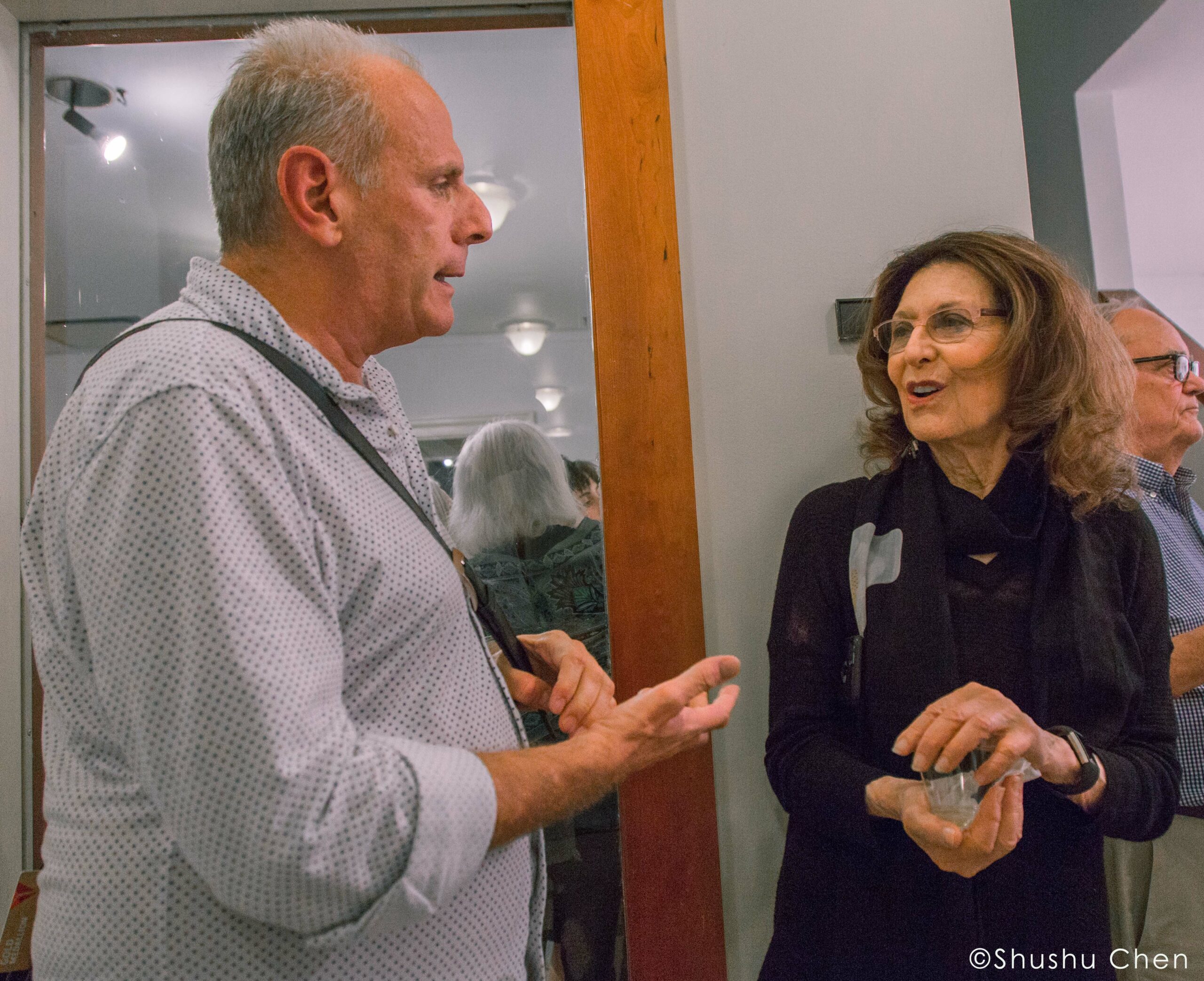 stefano-talking-to-lady-from-exhibition-opening-vintage-italy-1964-at-casa-italiana