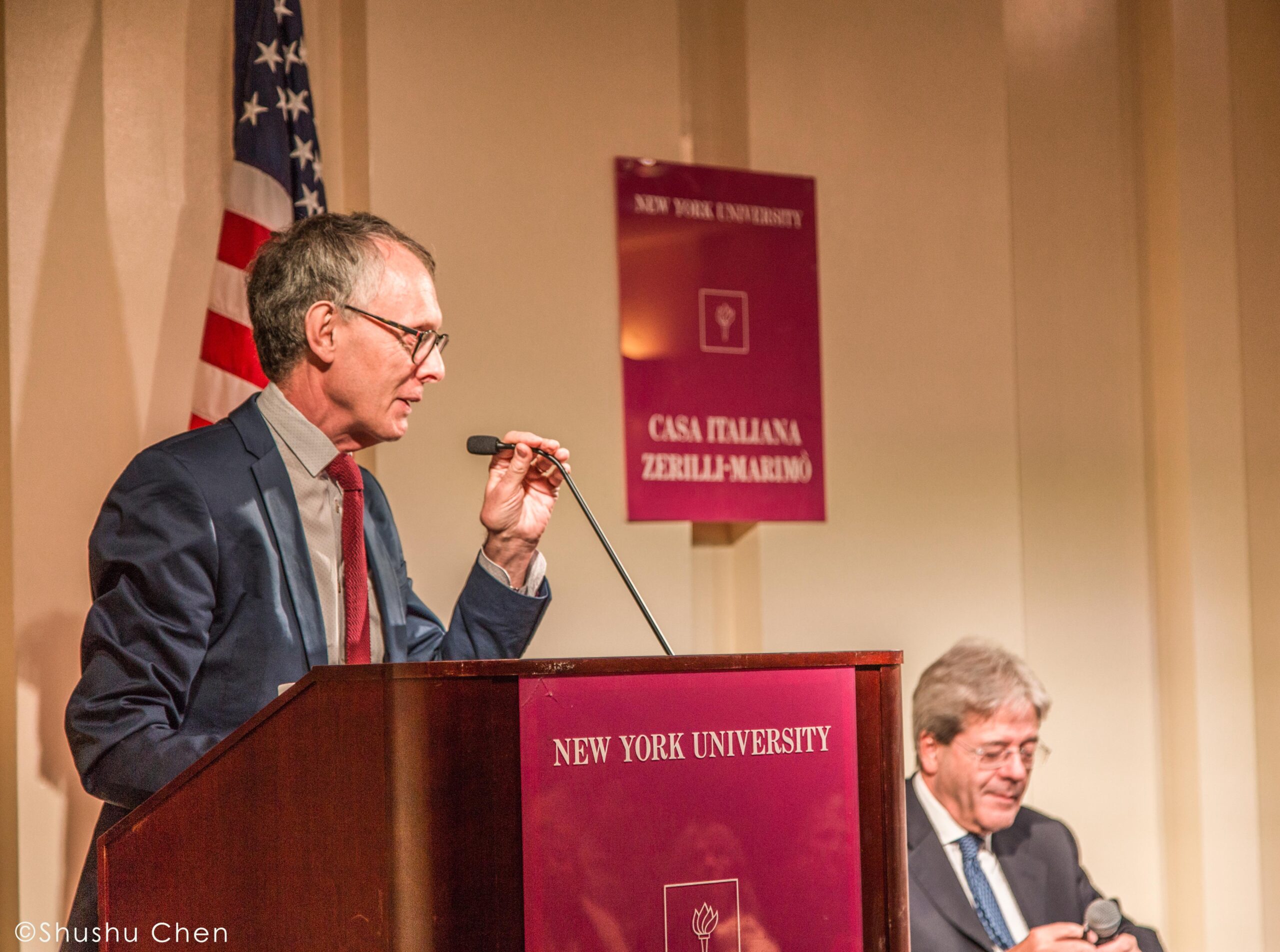 man-talking-from-italian-prime-minister-paolo-gentiloni-at-casa-italiana
