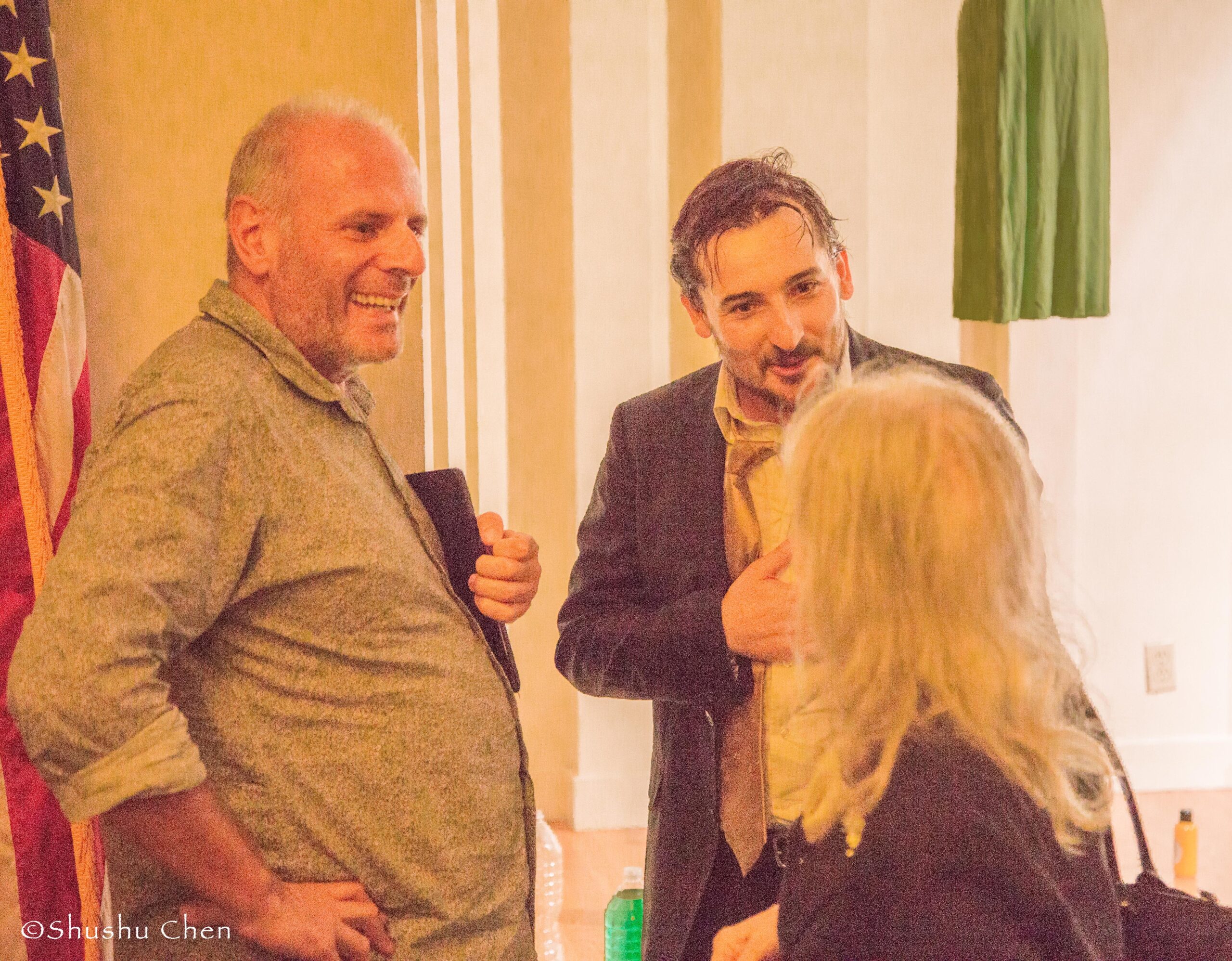 stefano-and-guests-conversing-with-woman-from-theatrical-performance-at-casa-italiana
