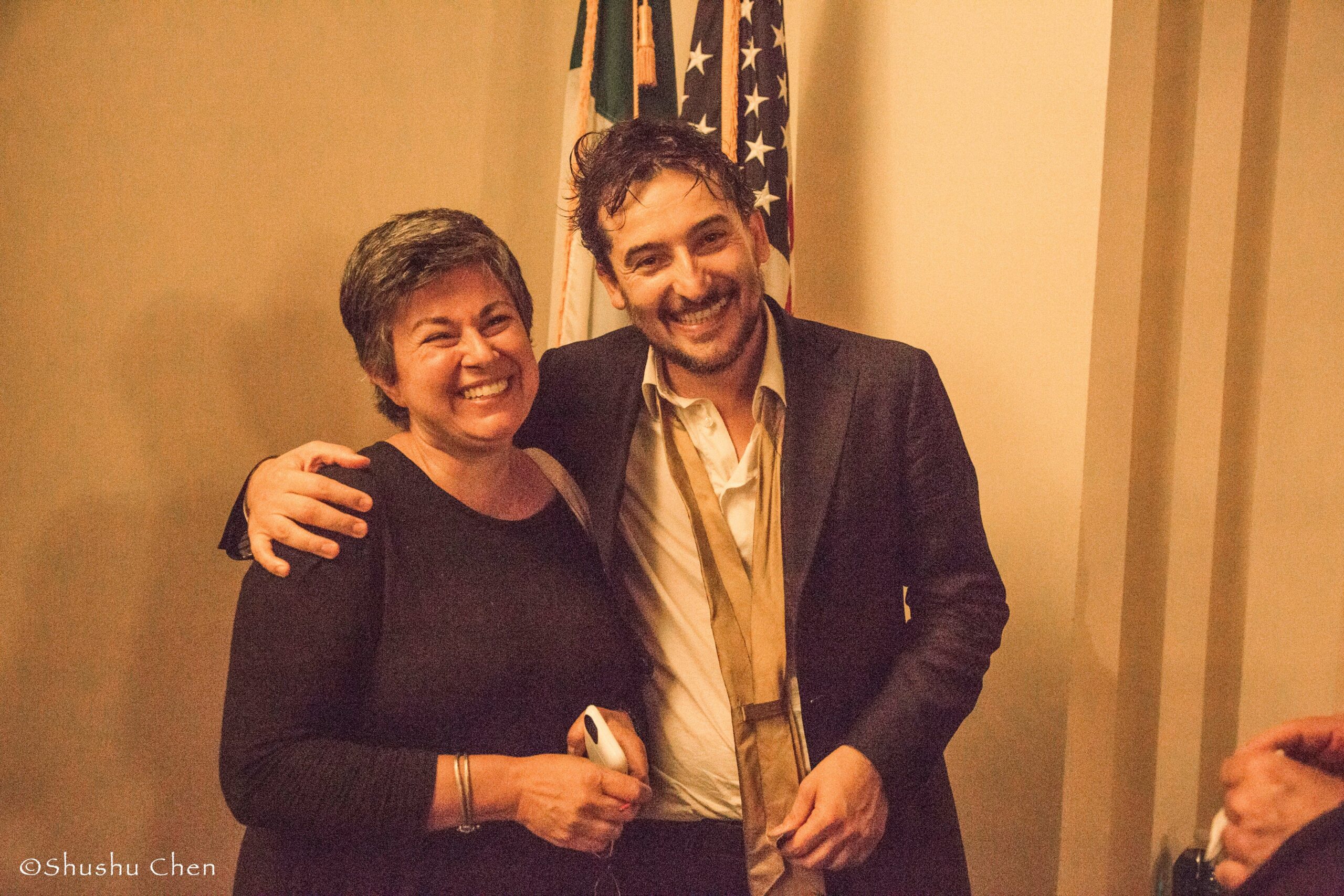 artist-with-woman-smiling-from-theatrical-performance-at-casa-italiana