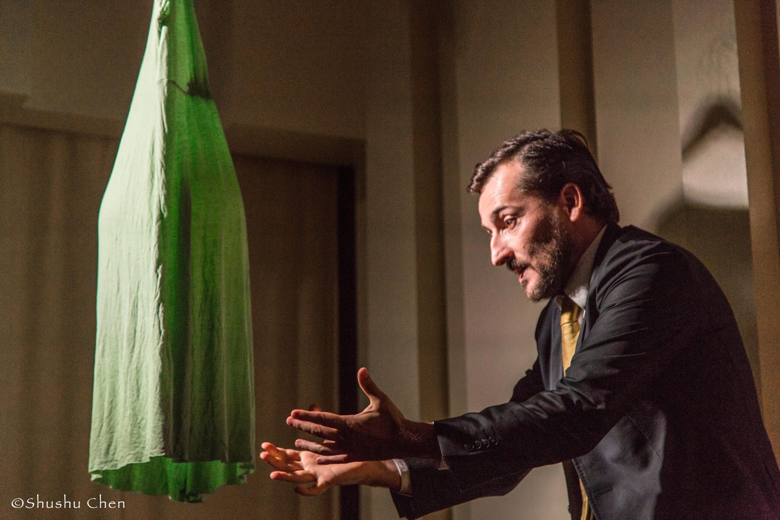 artist-performing-from-theatrical-performance-at-casa-italiana