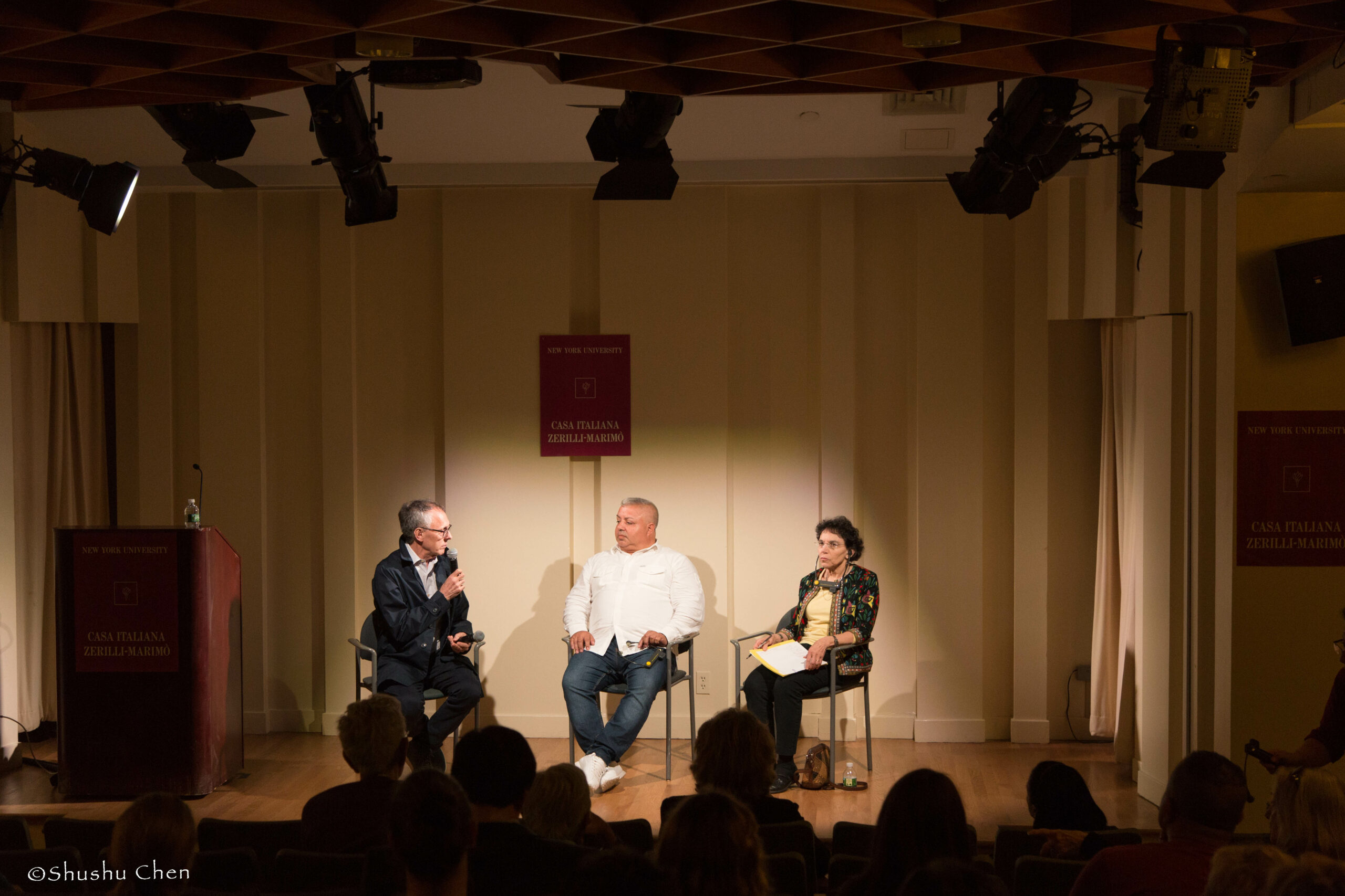 speaker-talking-from-panel-discussion-roma-migrations-at-casa-italiana