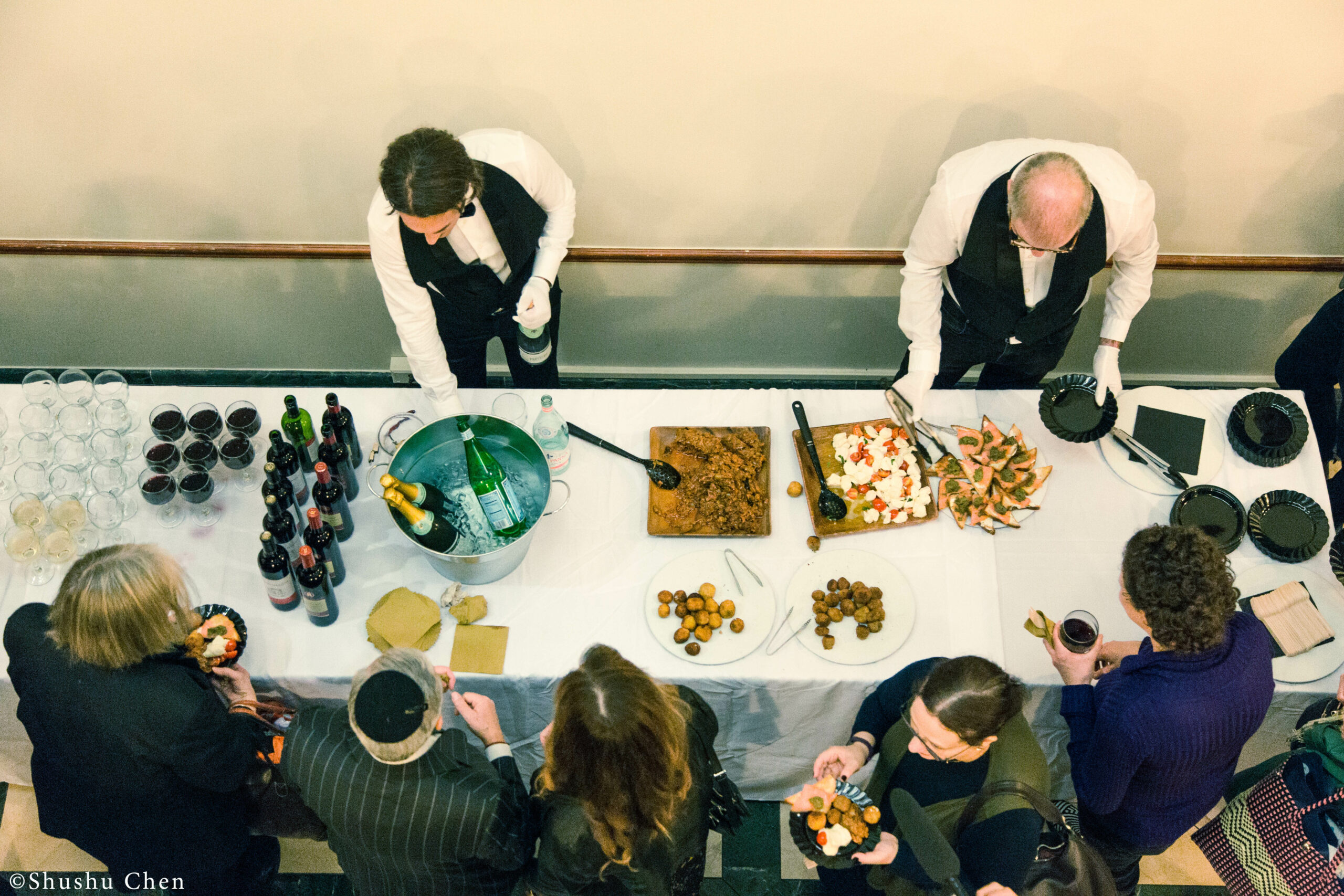 guests-eating-food-from-panel-the-babylonian-talmud-translation-project-at-casa-italiana