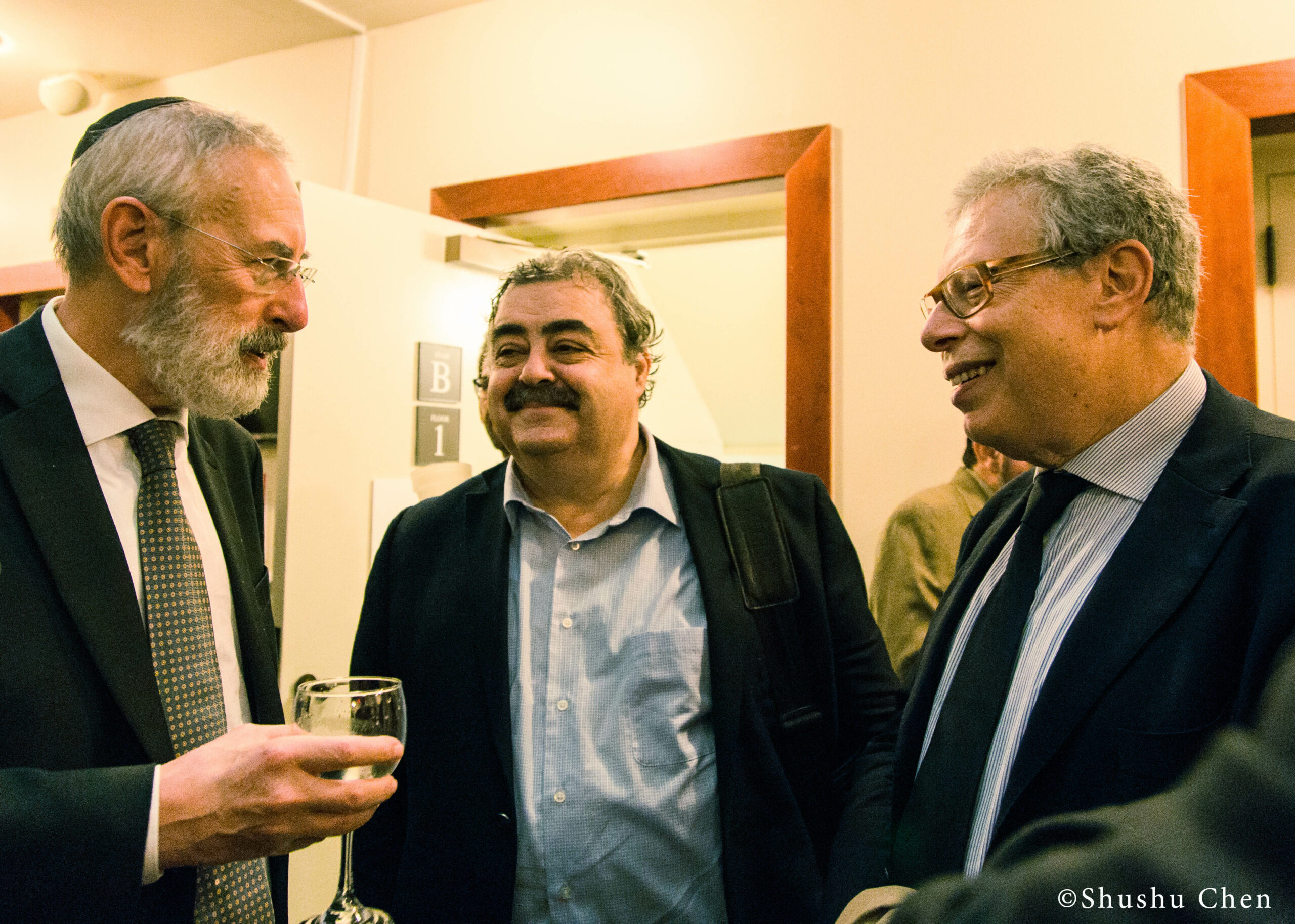 speaker-interacting-with-guests-from-panel-the-babylonian-talmud-translation-project-at-casa-italiana