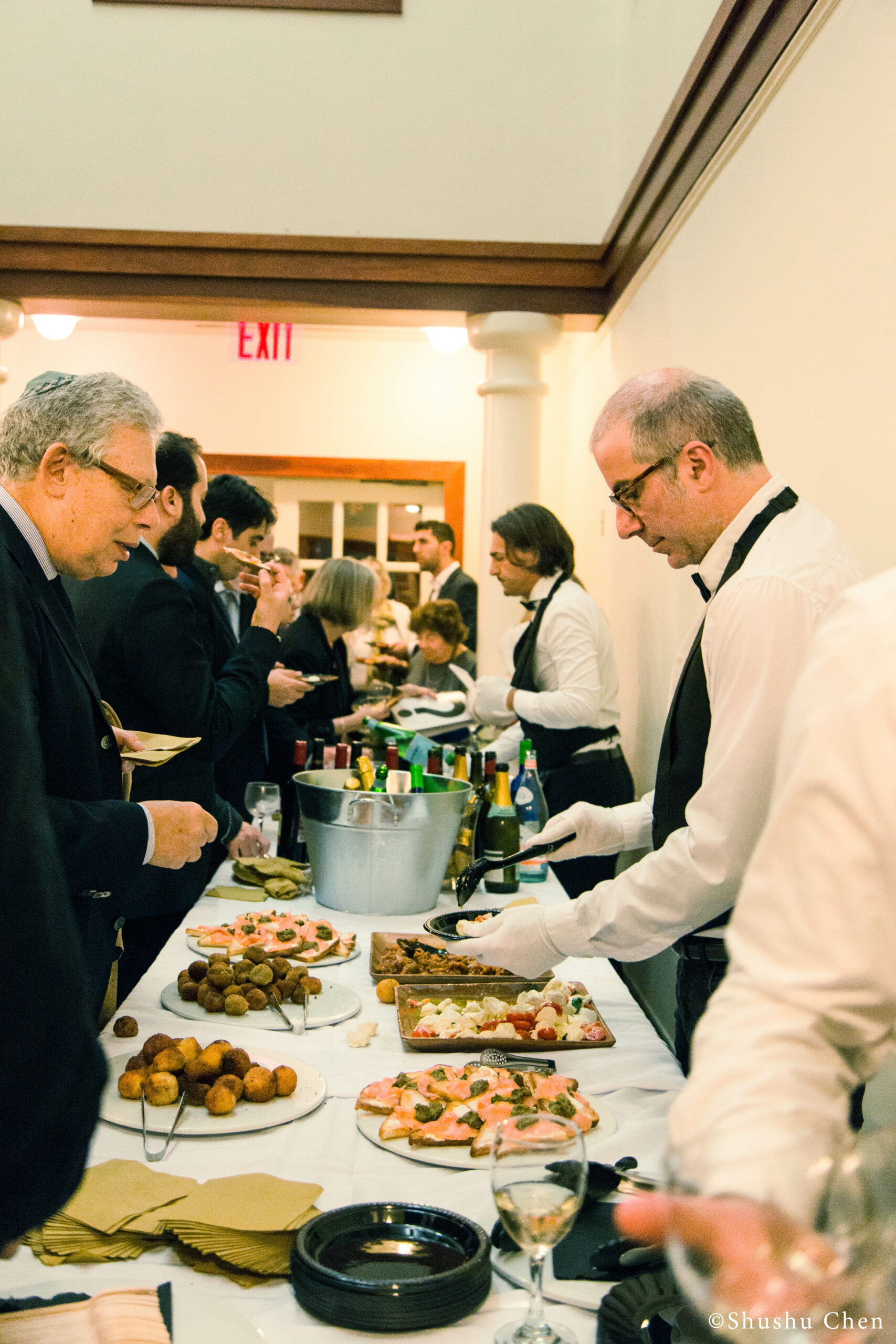 guests-eating-food-from-panel-the-babylonian-talmud-translation-project-at-casa-italiana