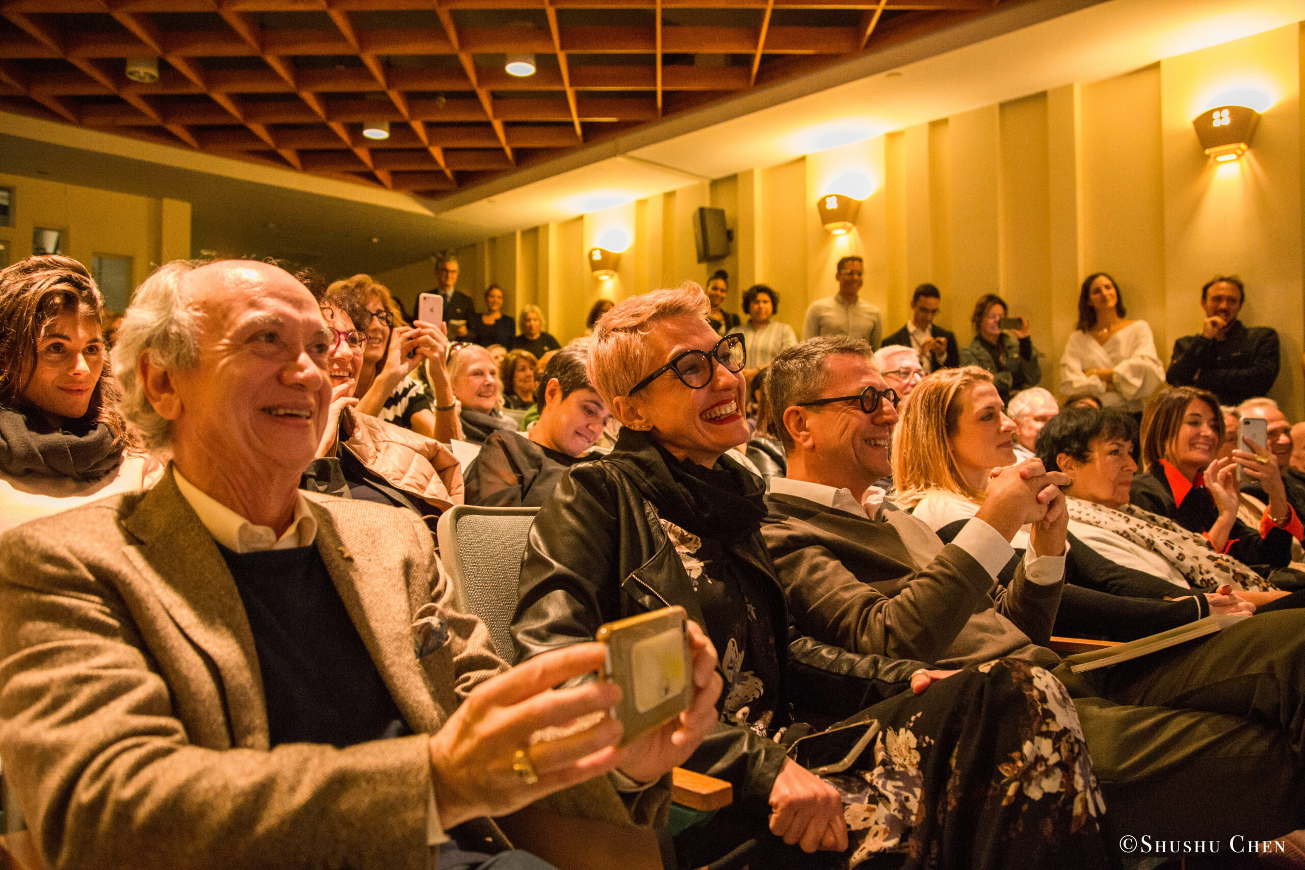 spectators-smiling-from-presentation-richard-gere-reads-italo-calvino-at-casa-italiana