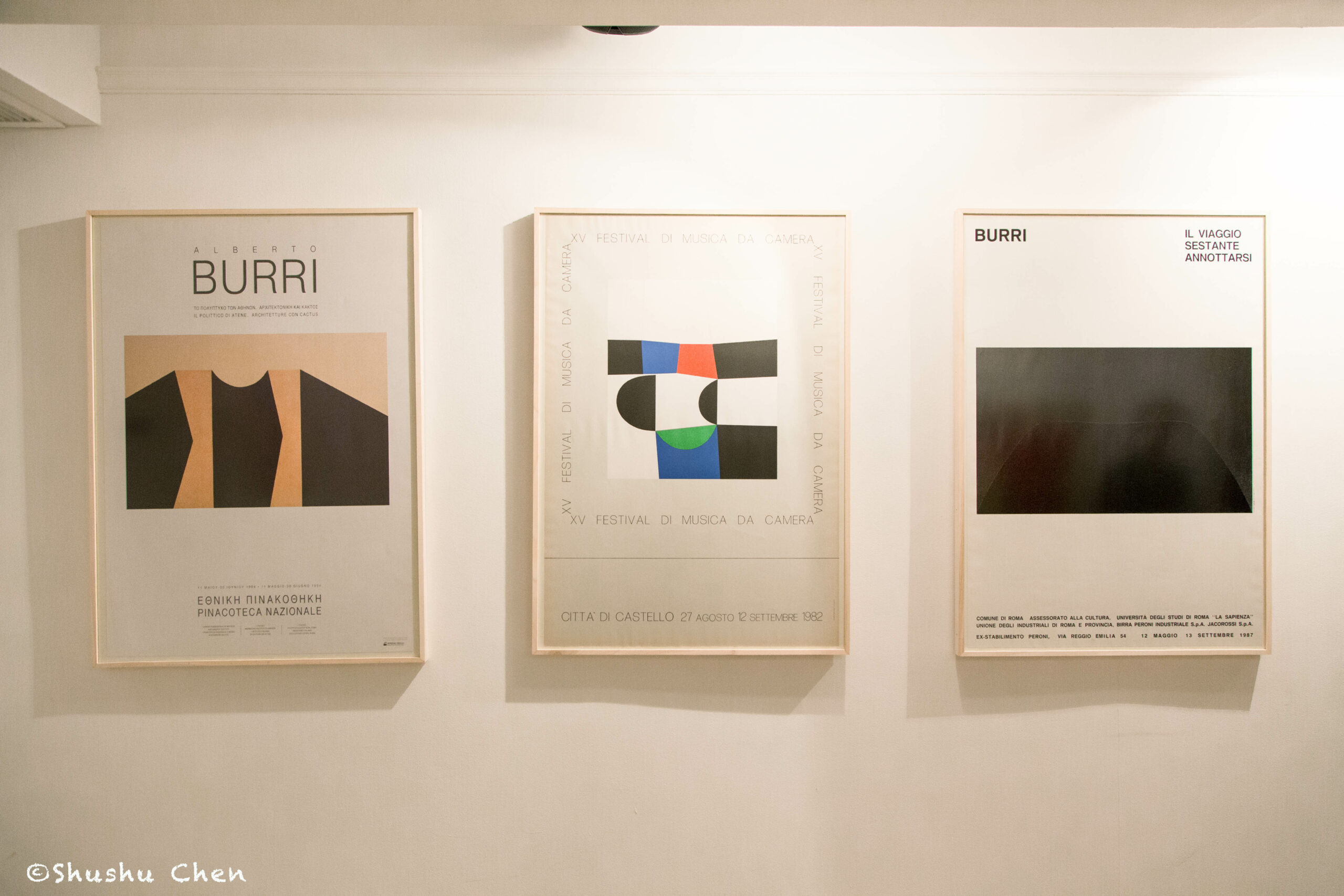 artworks-on-wall-from-exhibition-opening-burri-posters-at-casa-italiana