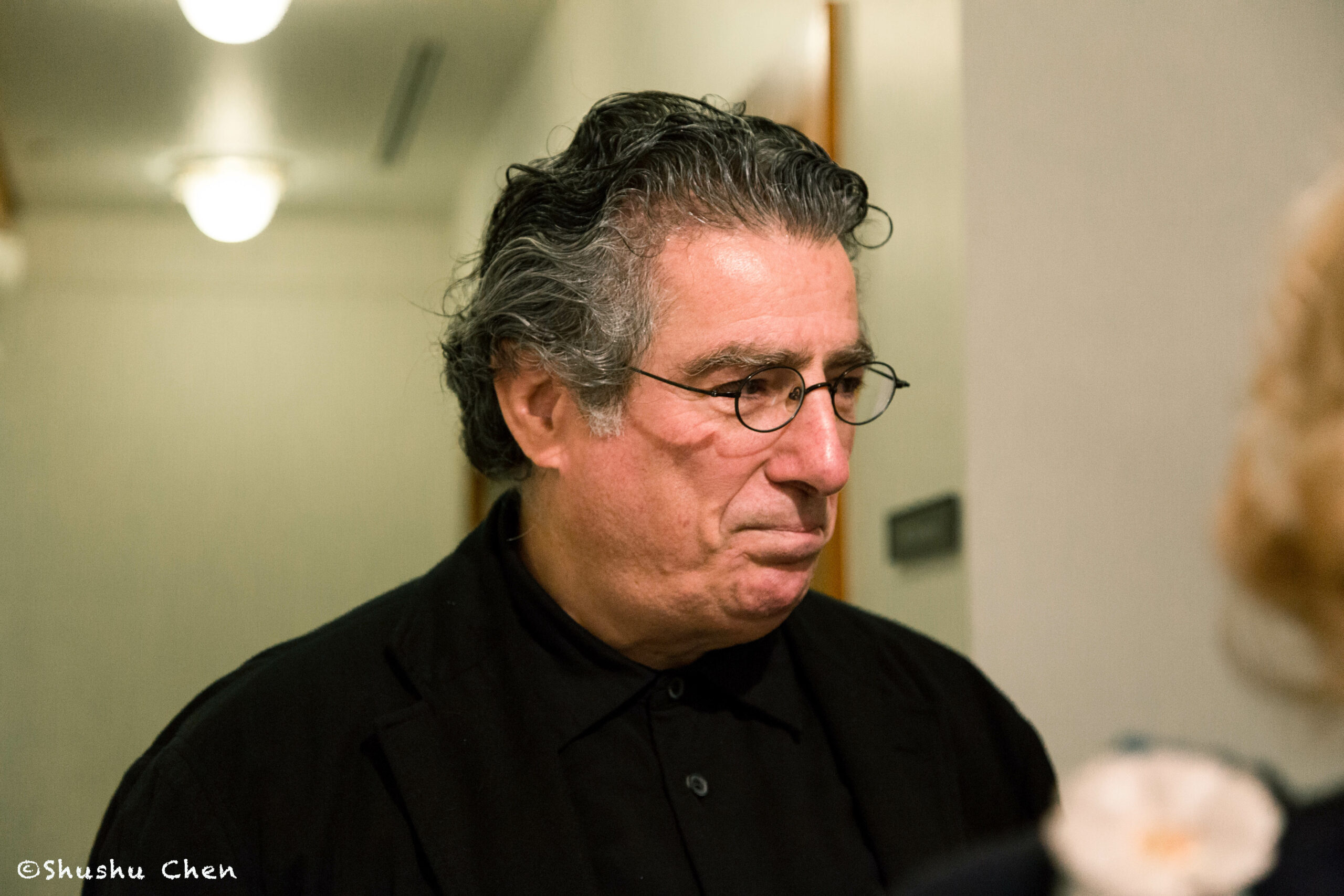 man-potrait-from-exhibition-opening-burri-posters-at-casa-italiana