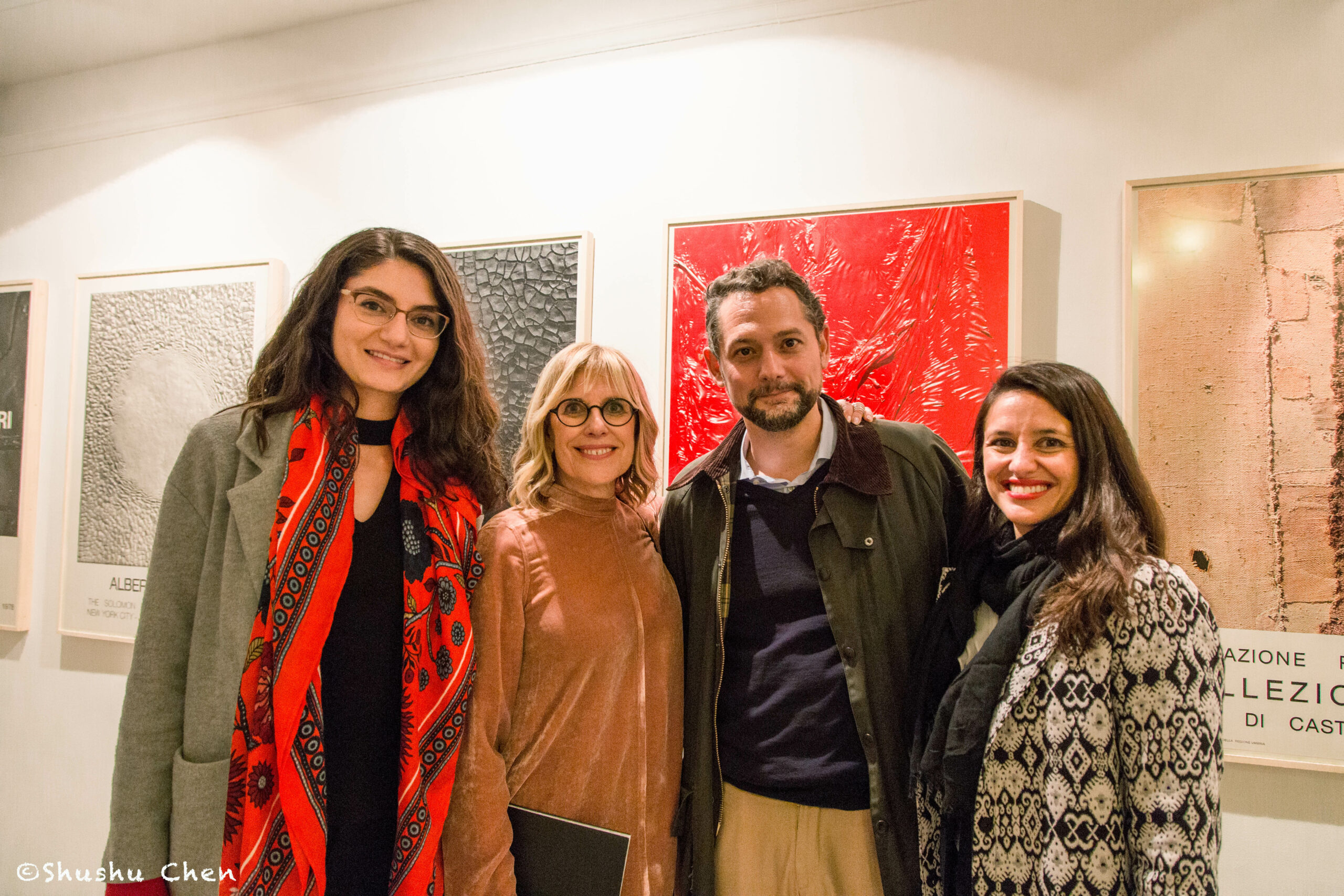 group-picture-with-artworks-in-background-from-exhibition-opening-burri-posters-at-casa-italiana