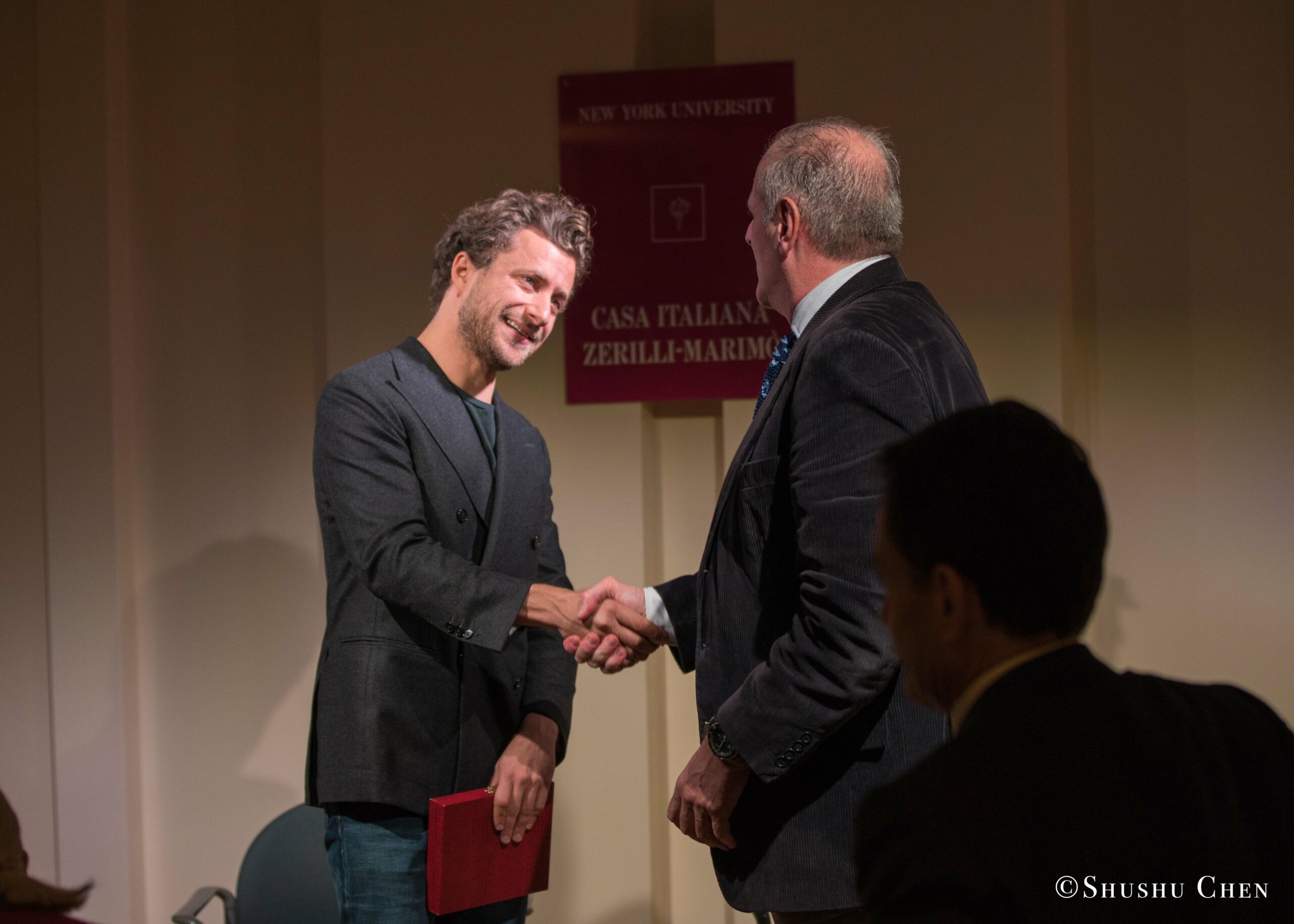 stefano-shaking-hands-with-speaker-from-nice-2017-screening-of-franca-at-casa-italiana