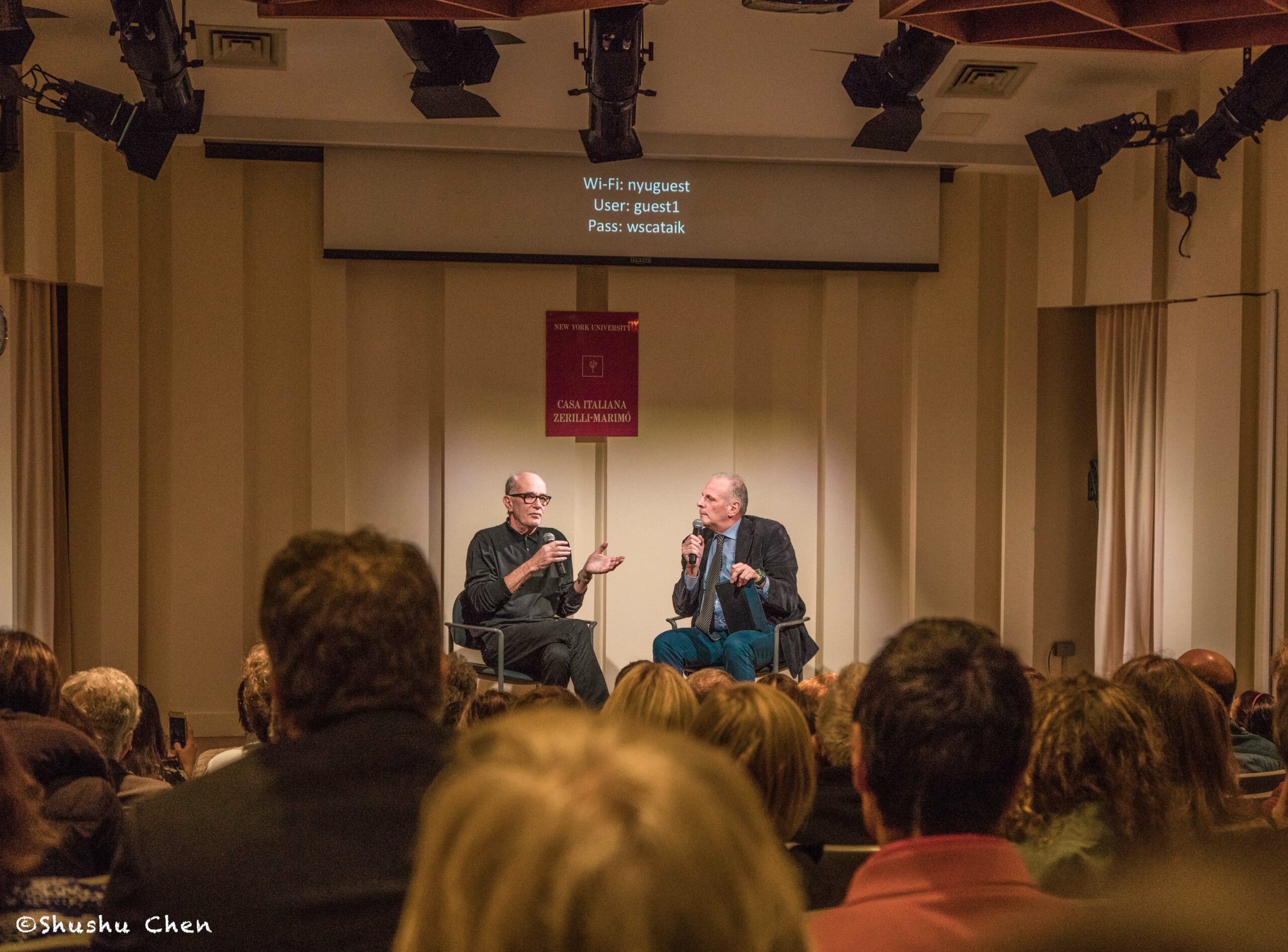 stefano-and-speaker-conversing-from-francesco-de-gregori-at-casa-italiana