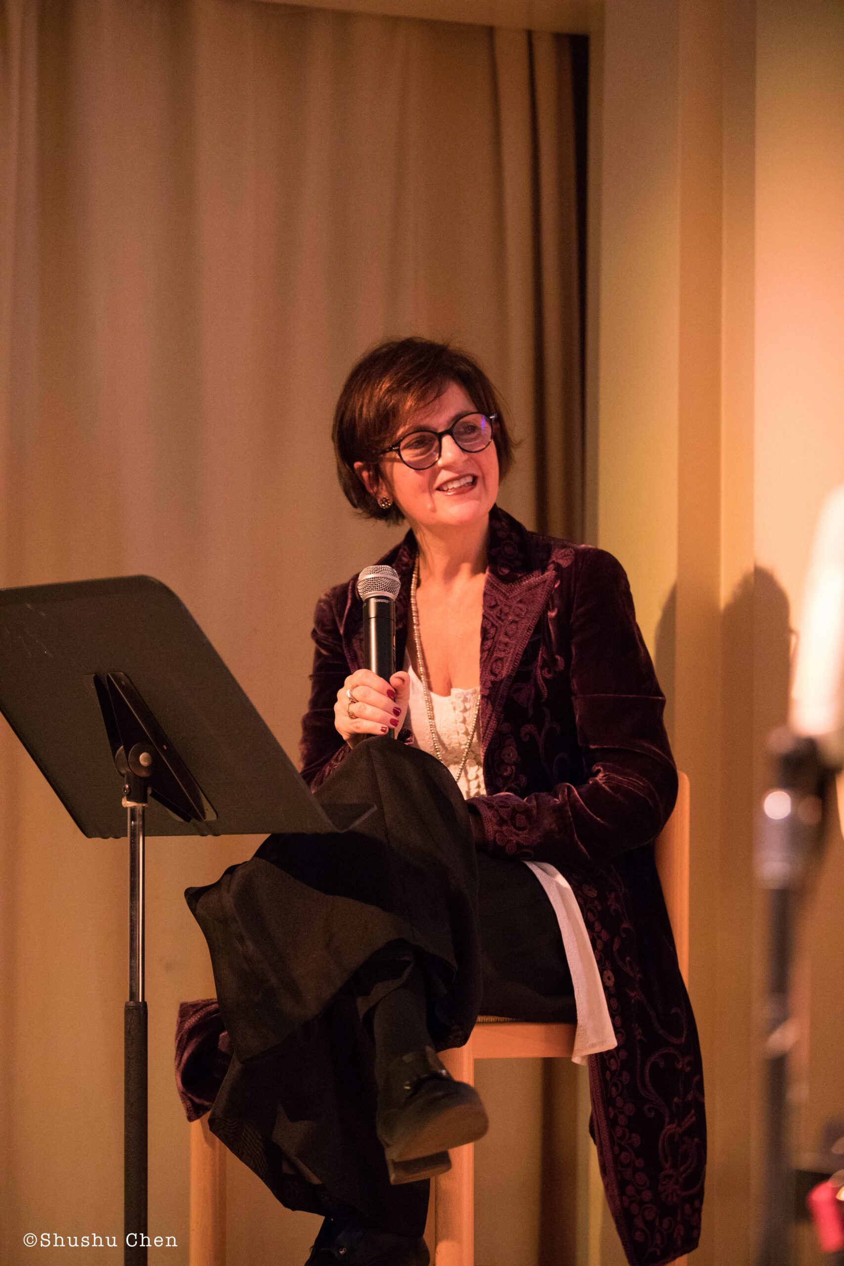 artist-smiling-from-concert-in-the-musical-wonderland-of-alessandra-at-casa-italiana