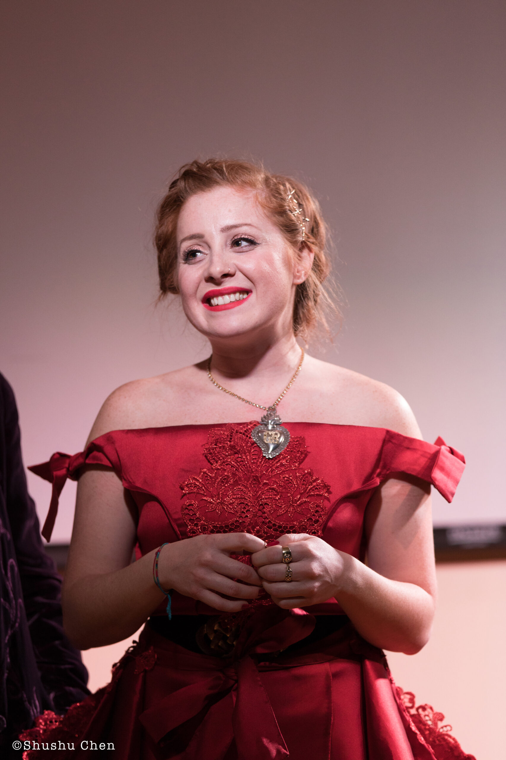 artist-smiling-from-concert-in-the-musical-wonderland-of-alessandra-at-casa-italiana