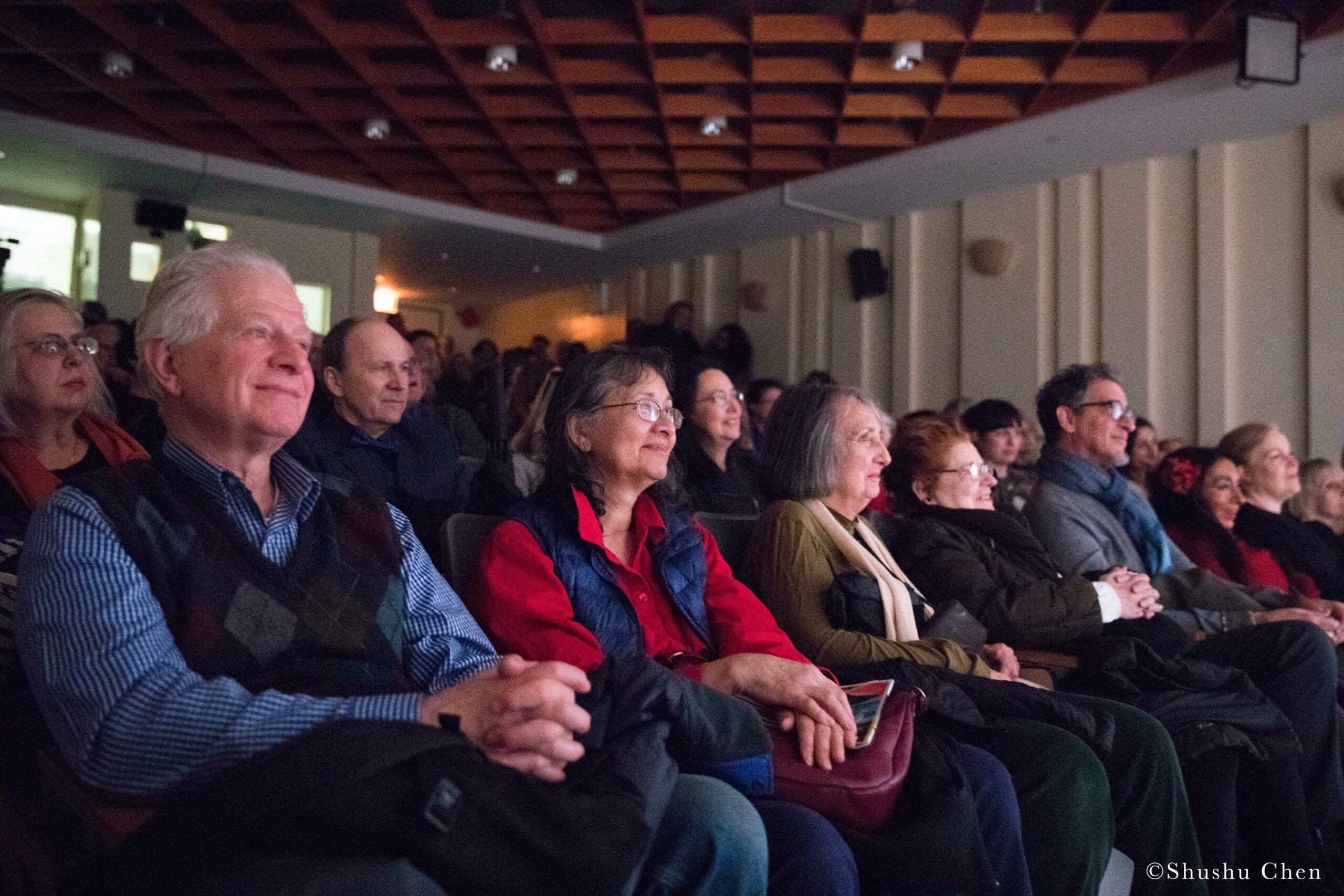 spectators-smiling-from-screening-pagani-and-dance-presentation-by-alessandra-belloni-and-i-giullari-di-piazza-at-casa-italiana