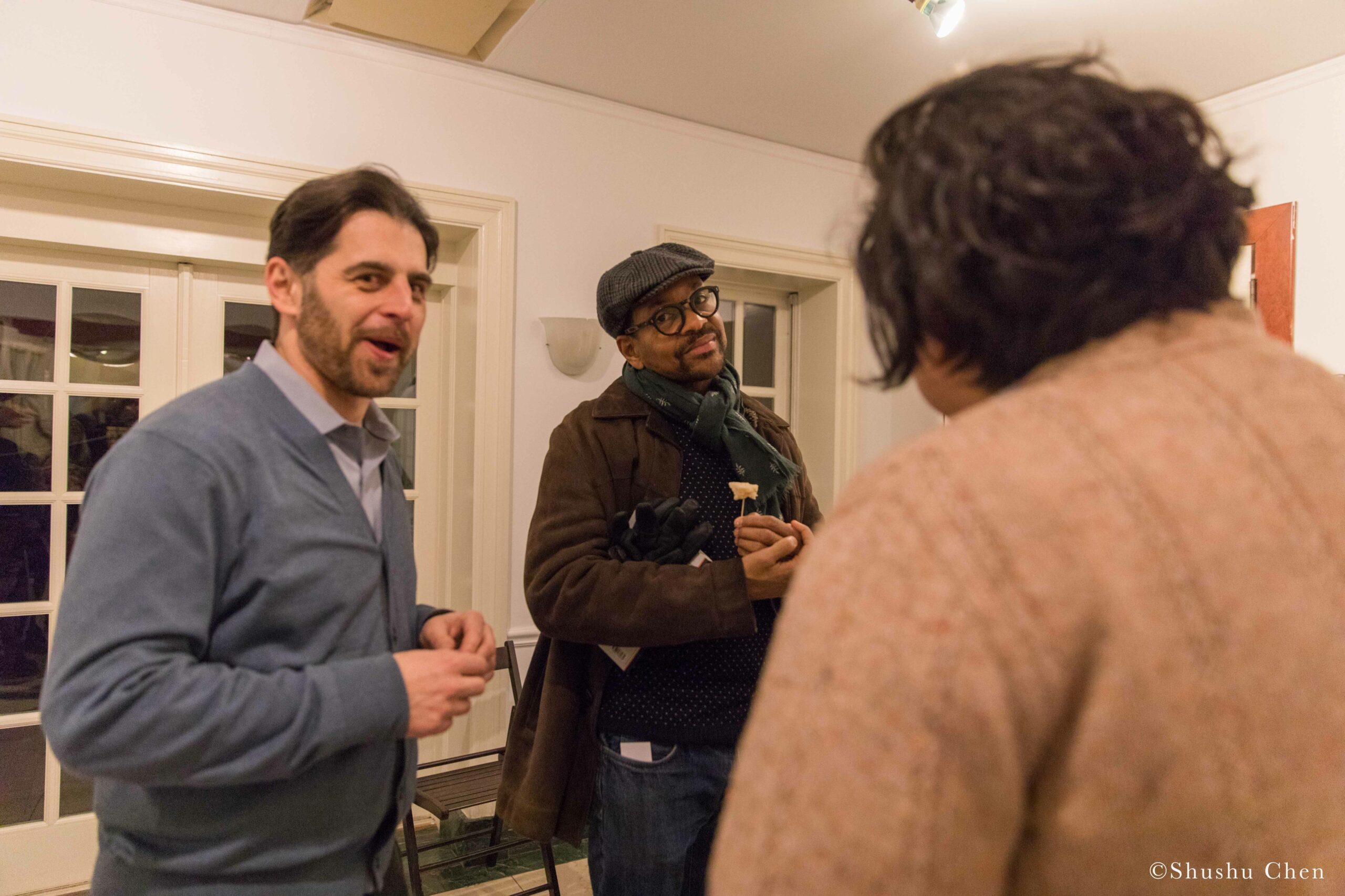 kostja-and-guests-smiling-from-exhibition-opening-resignifications-revisited-at-casa-italiana