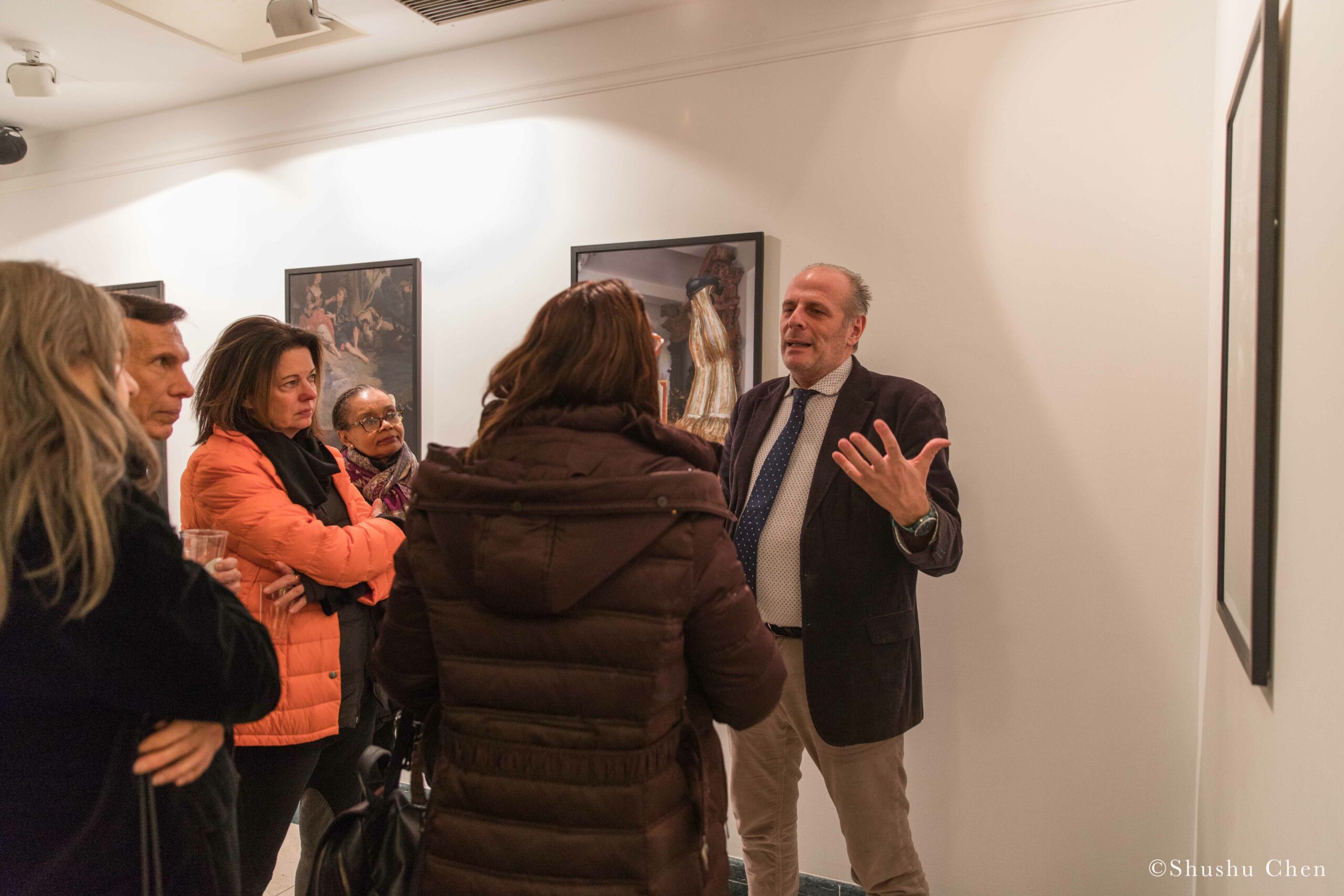stefano-and-guests-conversing-from-exhibition-opening-resignifications-revisited-at-casa-italiana