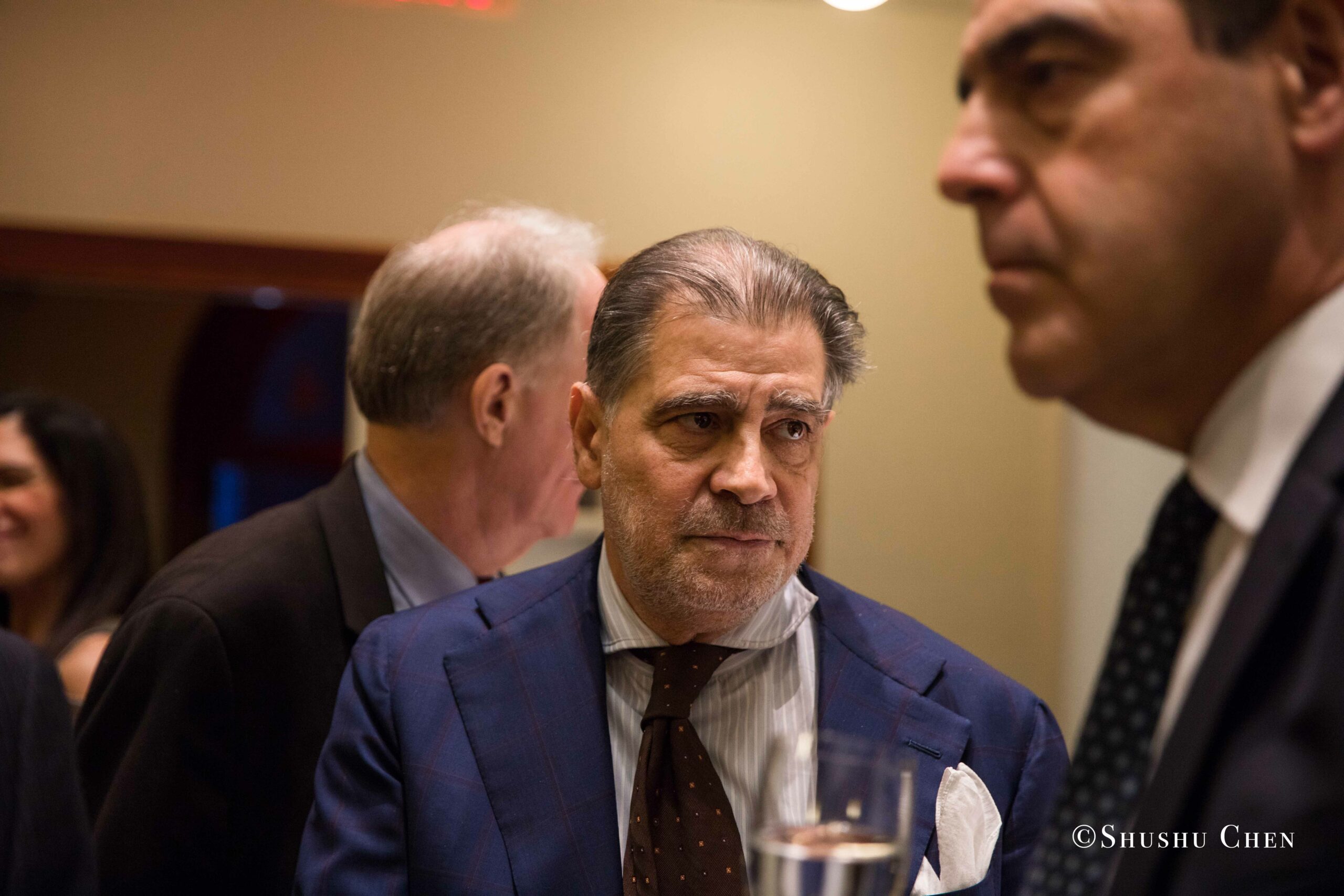 a-group-of-business-professionals-in-a-discussion-from-Italian-table-talks-at-casa-italiana