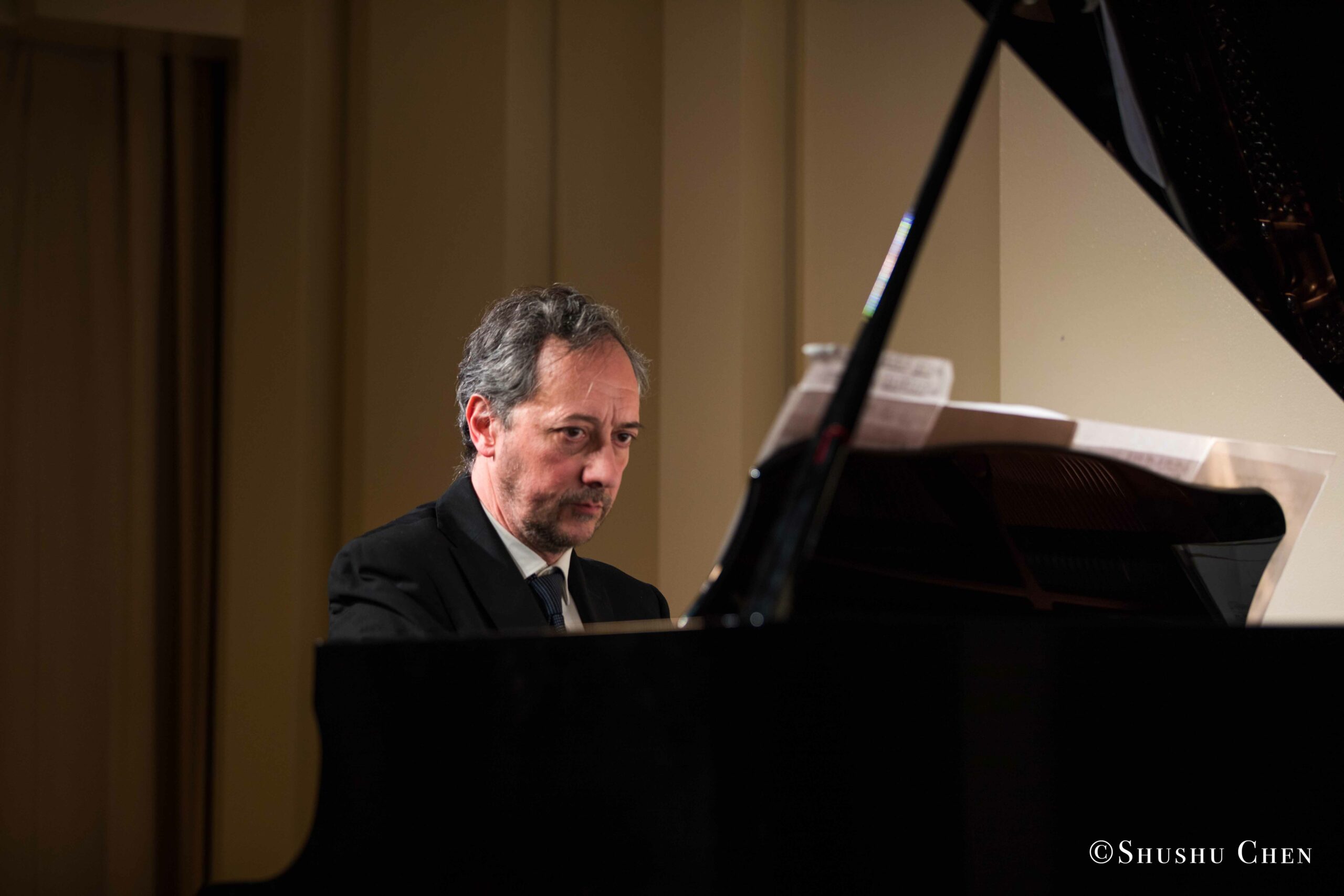 musician-playing-piano-from-concert-an-evening-with-piano-music-of-roberto-scarcella-perino-at-casa-italiana