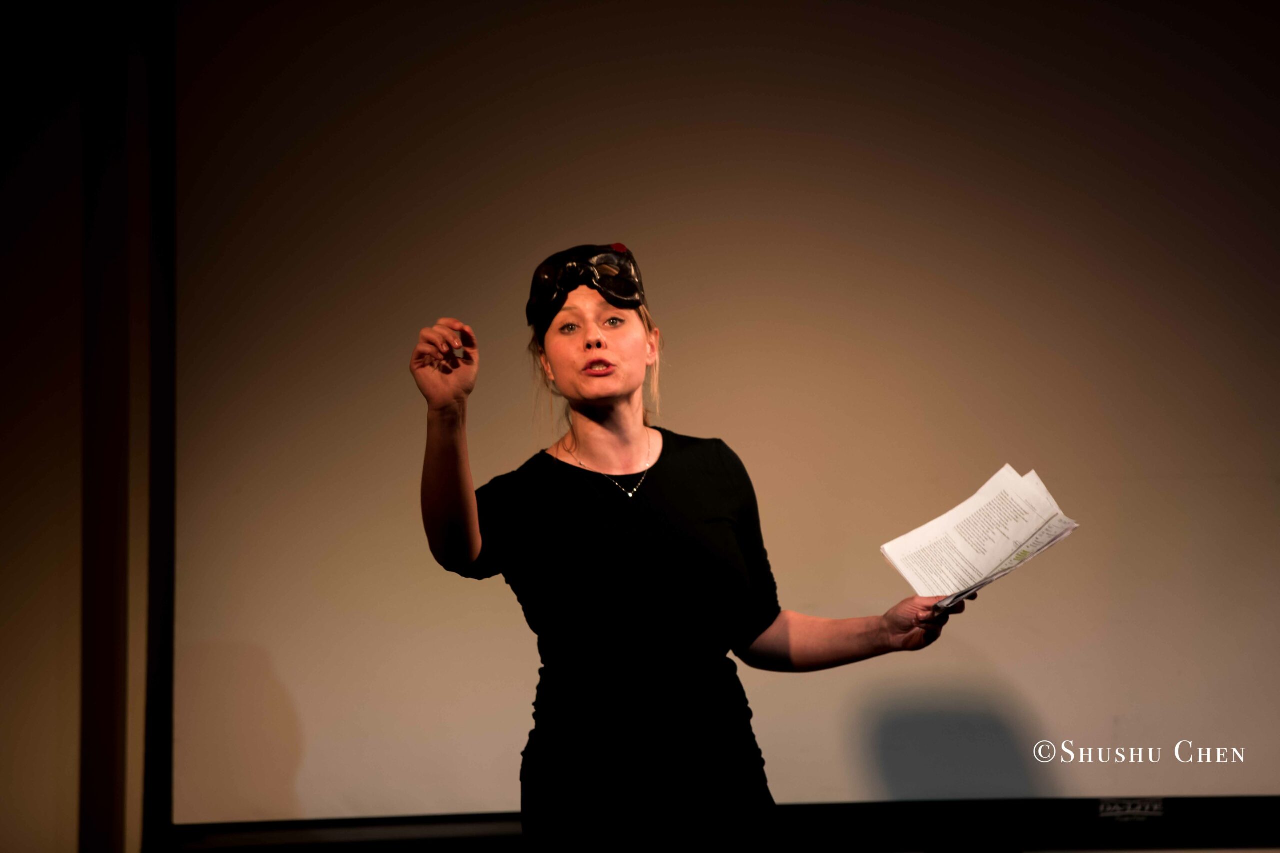 artist-performing-from-on-the-italian-stage-comedy-at-casa-italiana