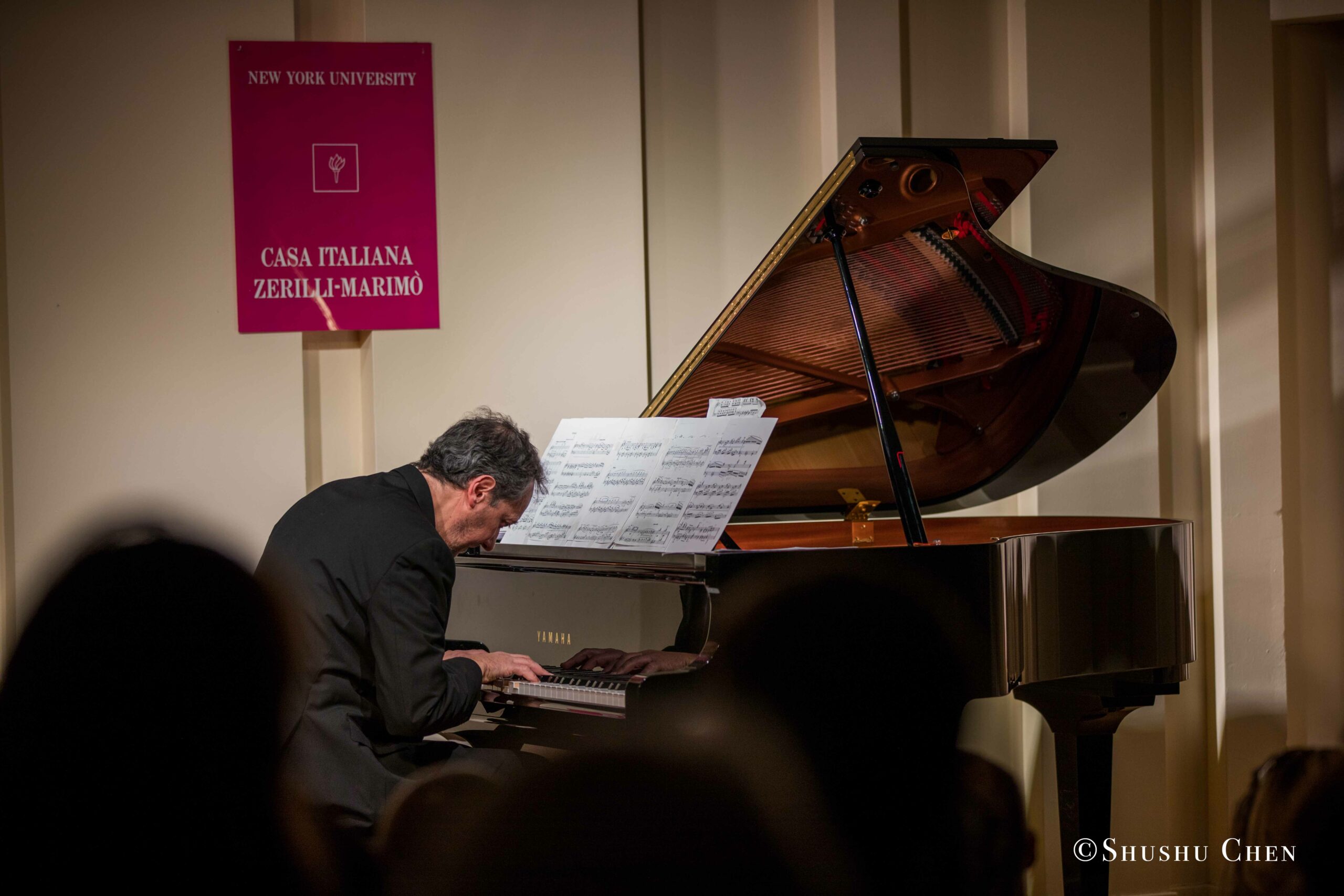 musician-playing-piano-from-concert-an-evening-with-piano-music-of-roberto-scarcella-perino-at-casa-italiana