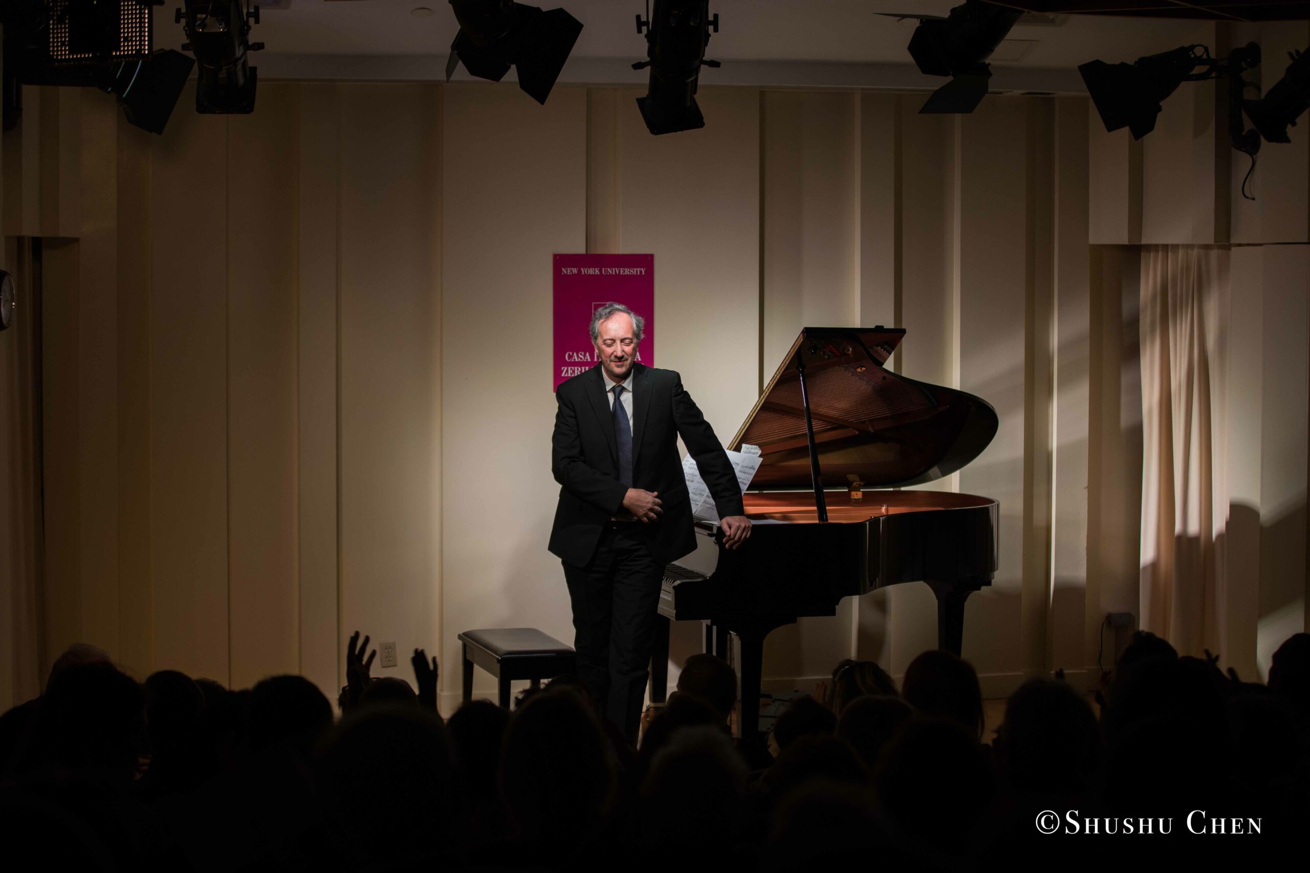 musician-standing-from-concert-an-evening-with-piano-music-of-roberto-scarcella-perino-at-casa-italiana