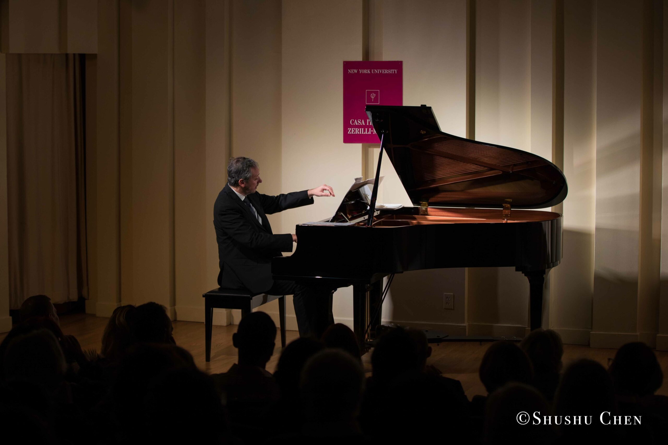 musician-playing-piano-from-concert-an-evening-with-piano-music-of-roberto-scarcella-perino-at-casa-italiana
