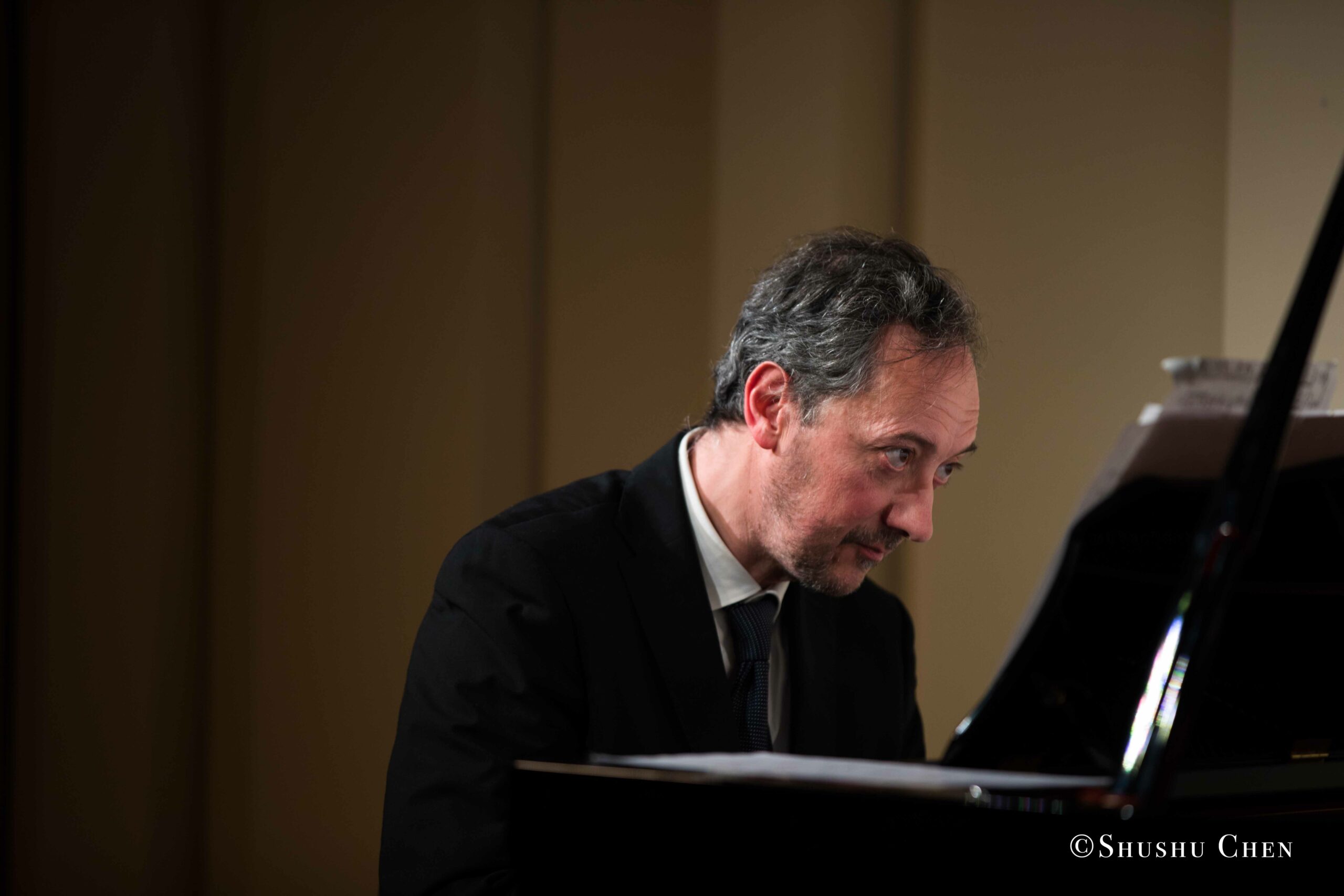 musician-playing-piano-from-concert-an-evening-with-piano-music-of-roberto-scarcella-perino-at-casa-italiana
