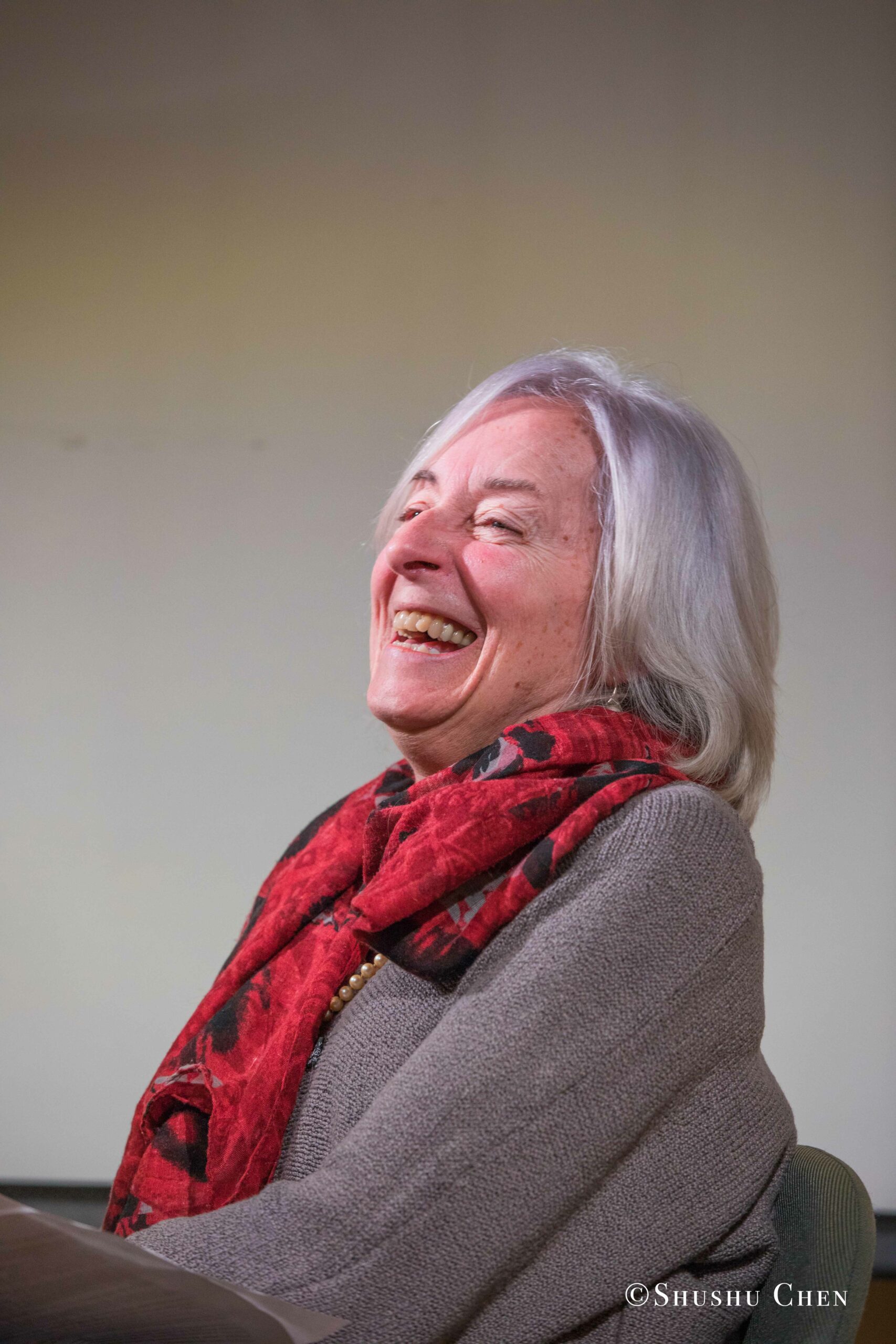 woman-smiling-from-book-presentation-grandangolo-at-casa-italiana