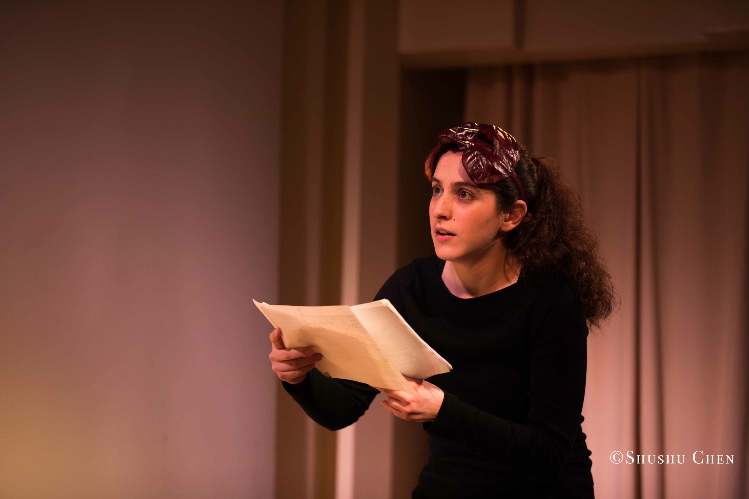 artist-performing-from-on-the-italian-stage-comedy-at-casa-italiana
