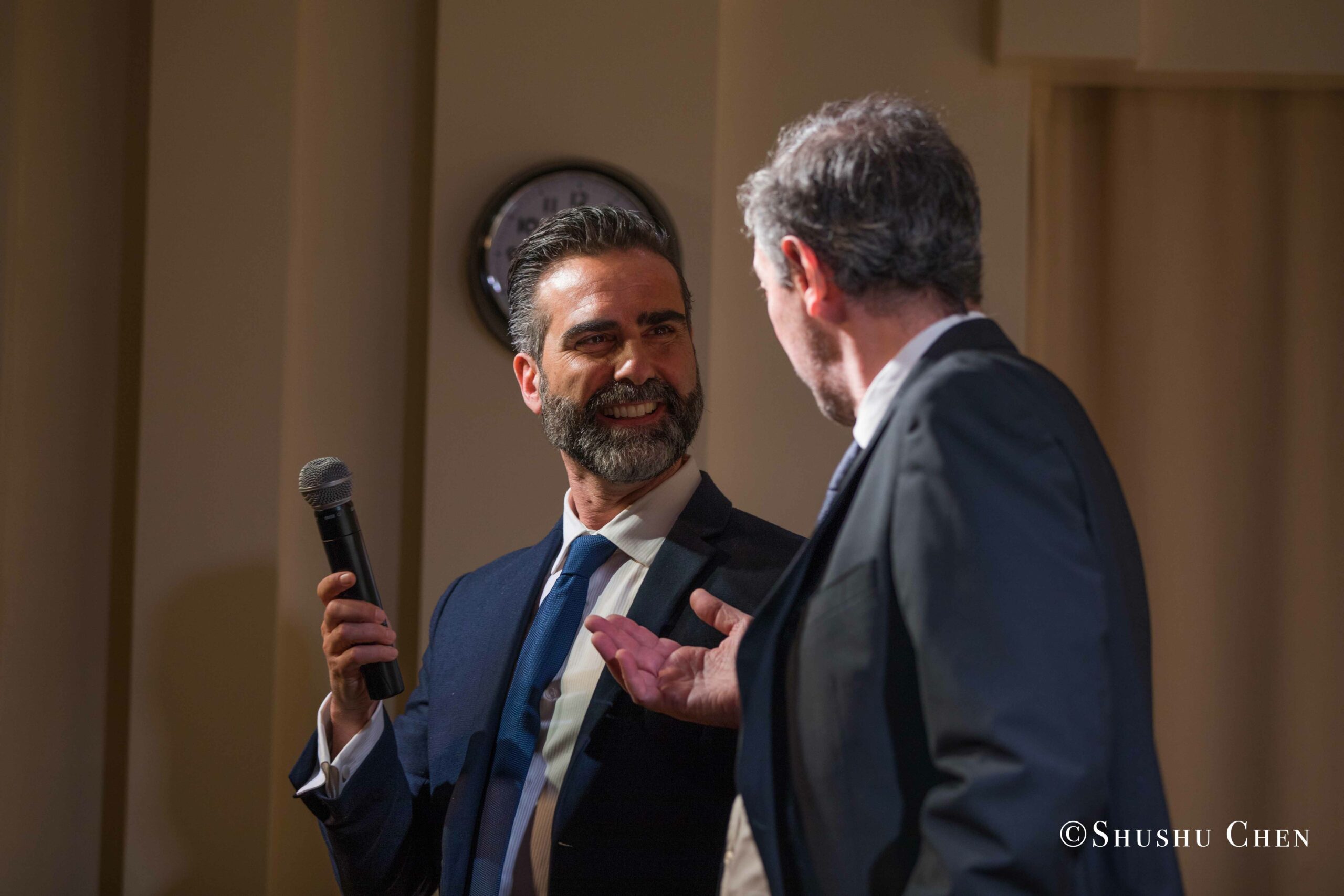 speaker-and-artist-talking-from-concert-an-evening-with-piano-music-of-roberto-scarcella-perino-at-casa-italiana