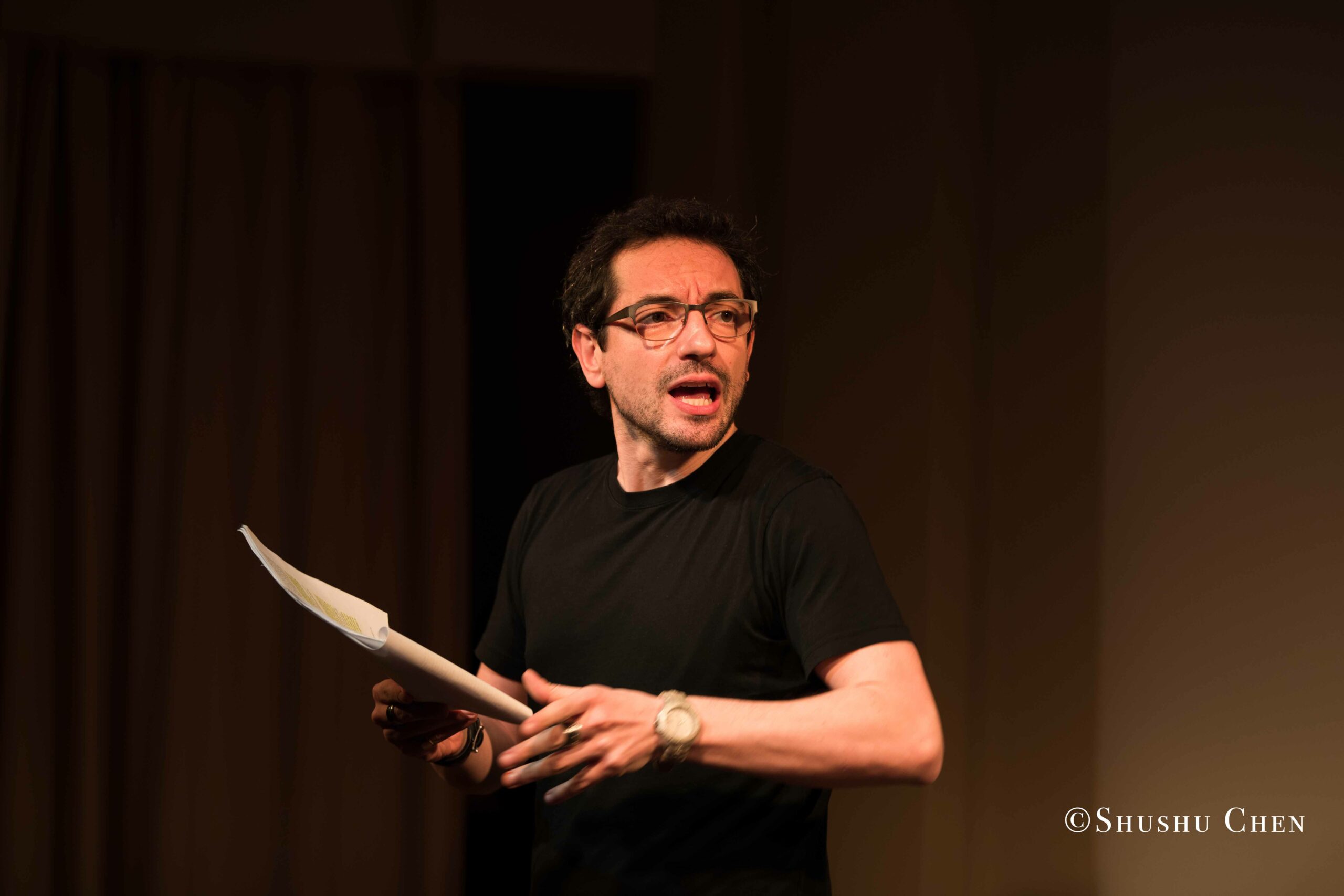 artist-performing-from-on-the-italian-stage-comedy-at-casa-italiana