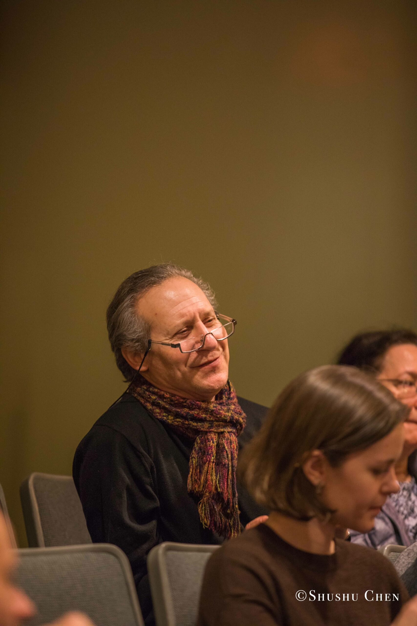 spectator-smiling-from-book-presentation-grandangolo-at-casa-italiana
