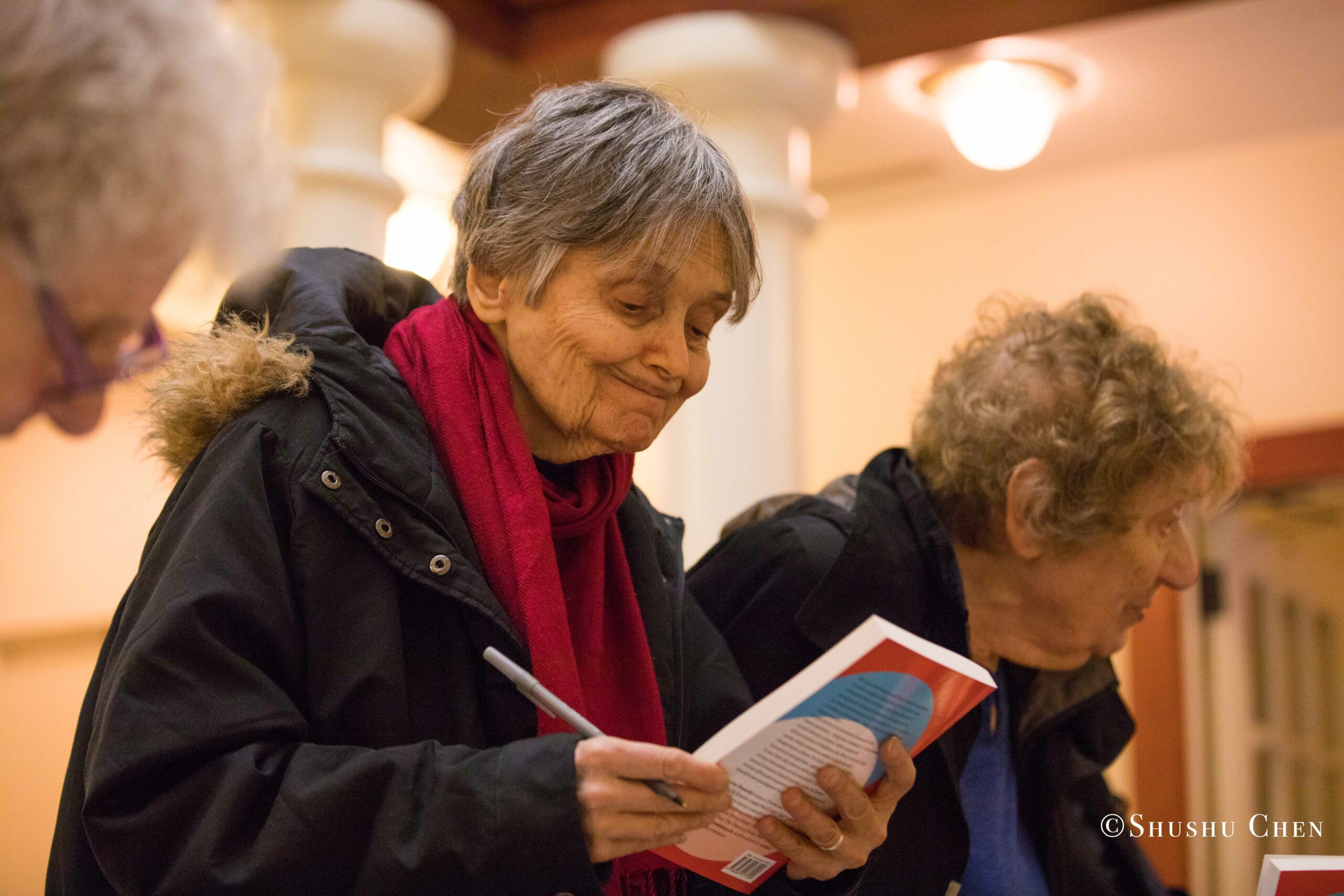 woman-reading-book-from-book-presentation-grandangolo-at-casa-italiana