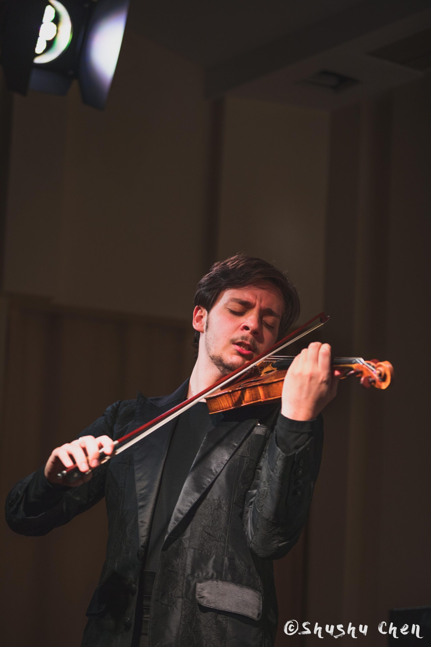 musician-playing-violin-from-concert-andrea-obiso-violin-recital-at-casa-italiana