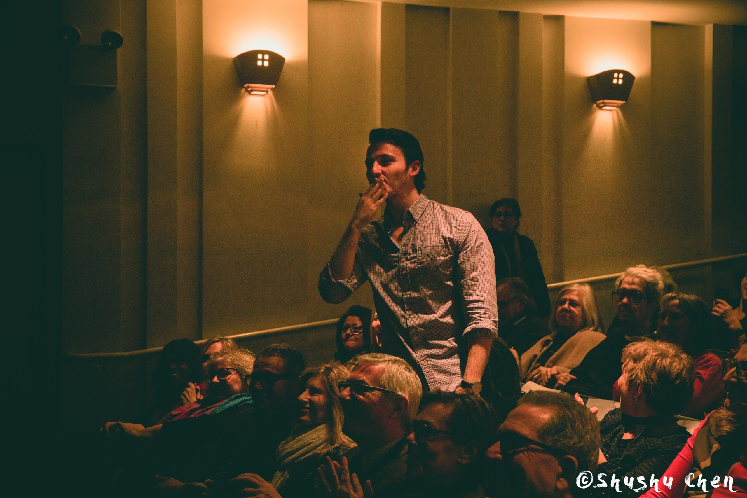 spectator-giving-flying-kiss-from-us-premiere-screening-i-siciliani-at-casa-italiana