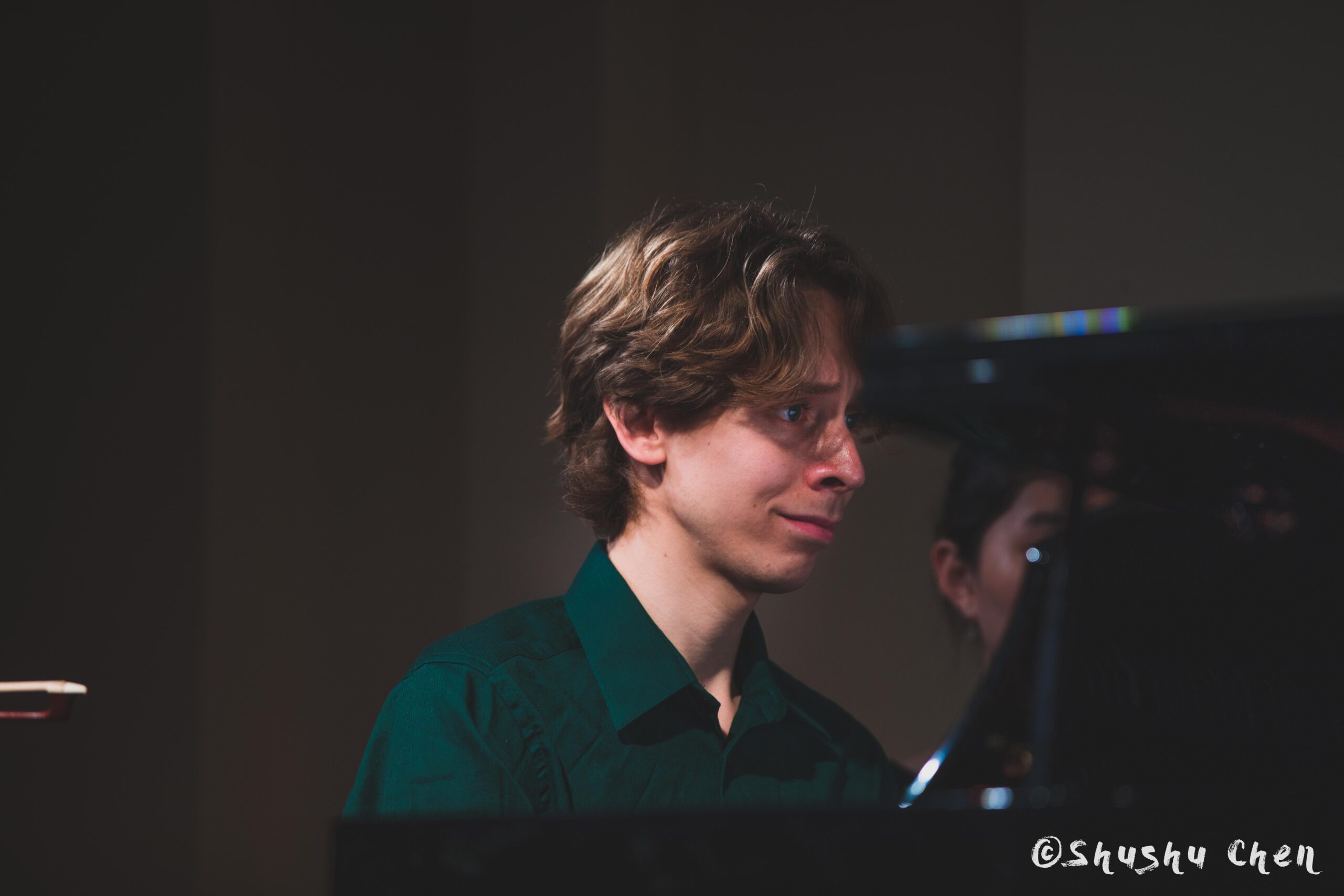 musician-playing-piano-from-concert-andrea-obiso-violin-recital-at-casa-italiana