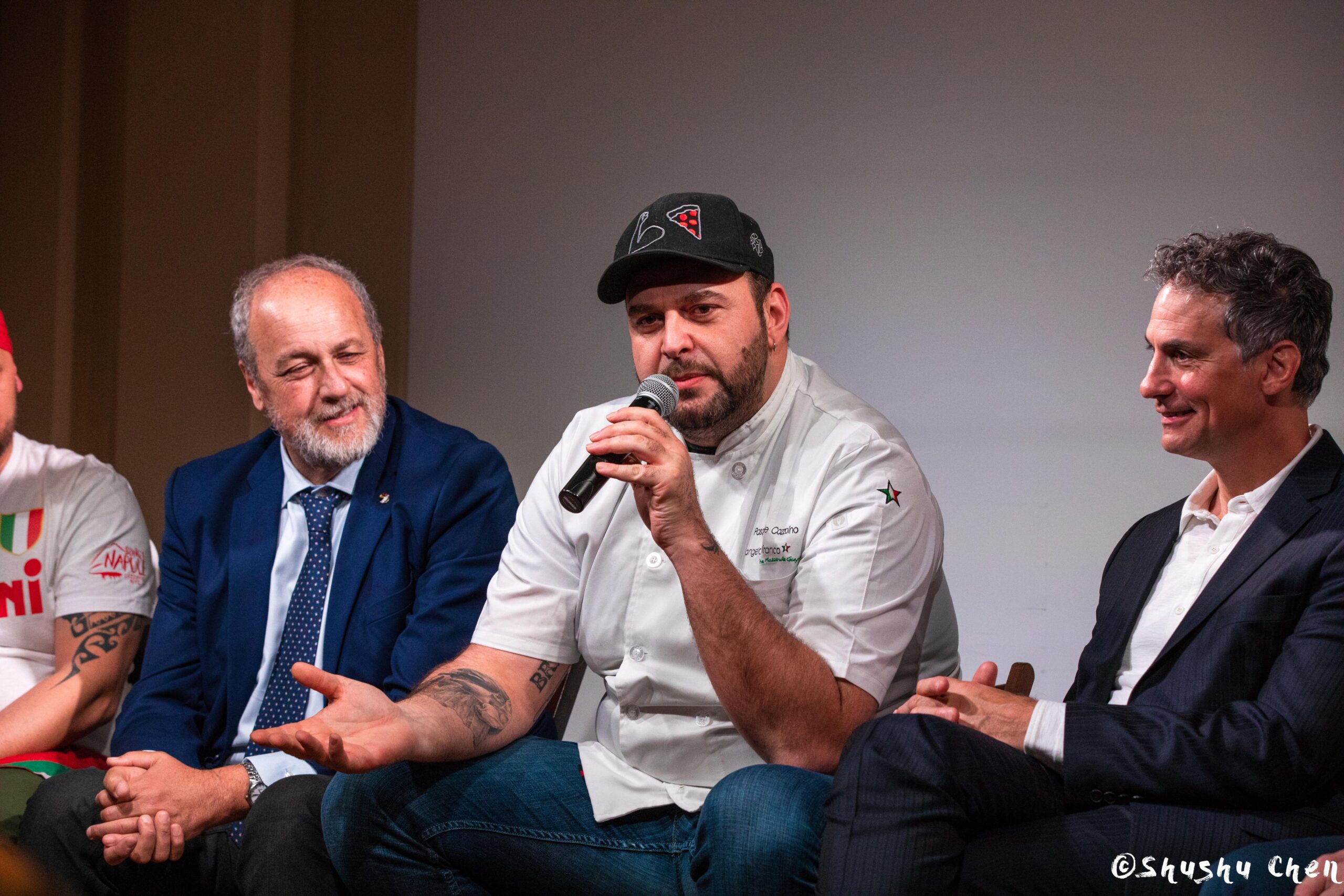 speaker-talking-from-ny-premiere-screening-of-arrangiarsi-and-presentation-at-casa-italiana