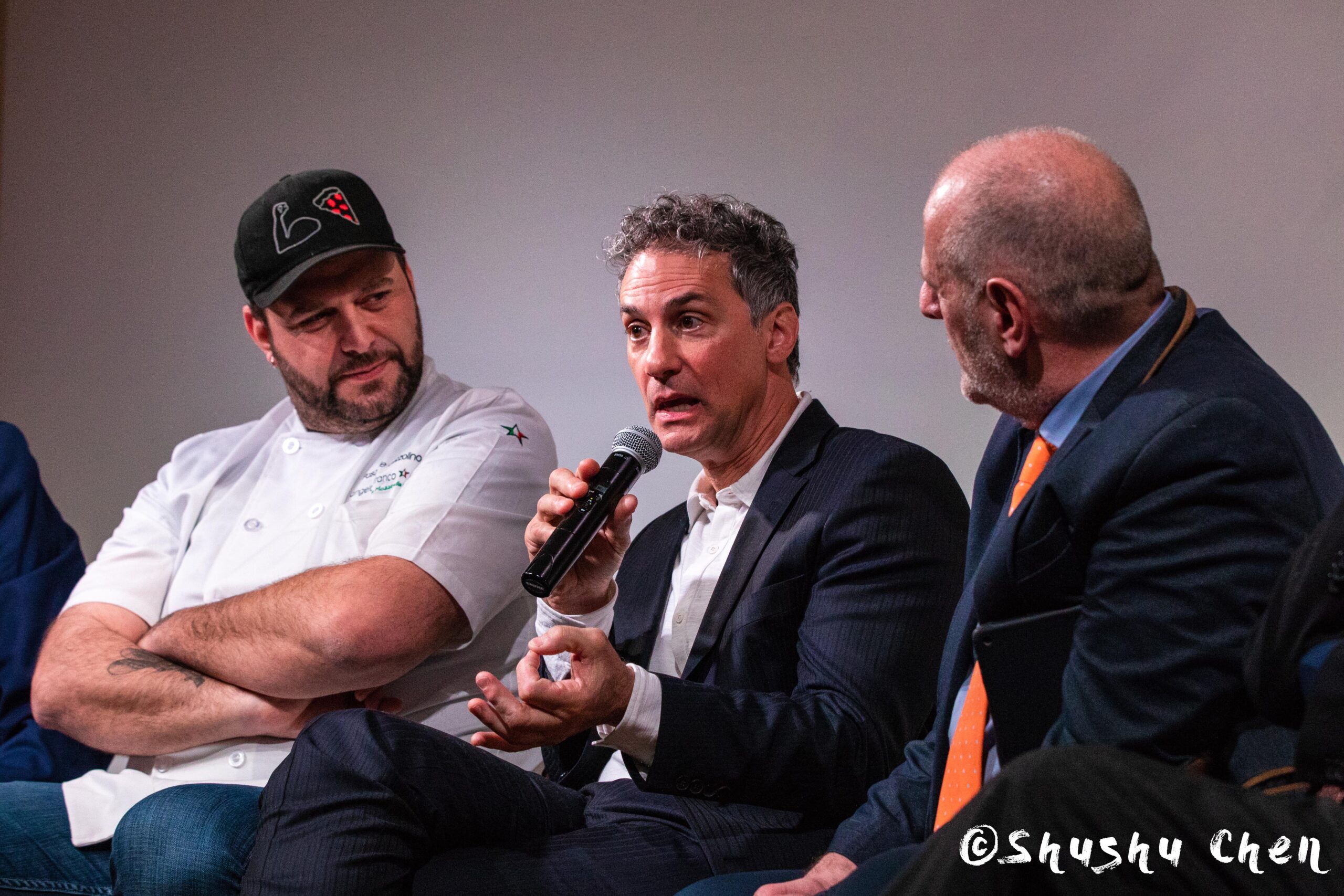 speaker-talking-from-ny-premiere-screening-of-arrangiarsi-and-presentation-at-casa-italiana