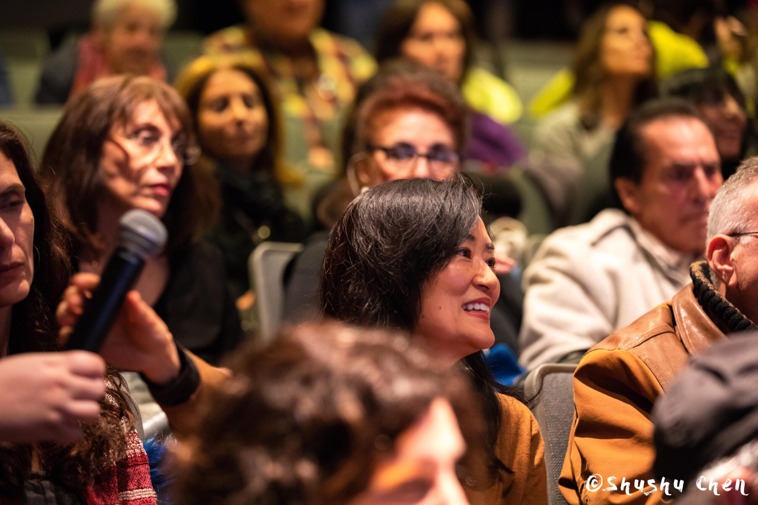 spectator-smiling-from-ny-premiere-screening-of-arrangiarsi-and-presentation-at-casa-italiana