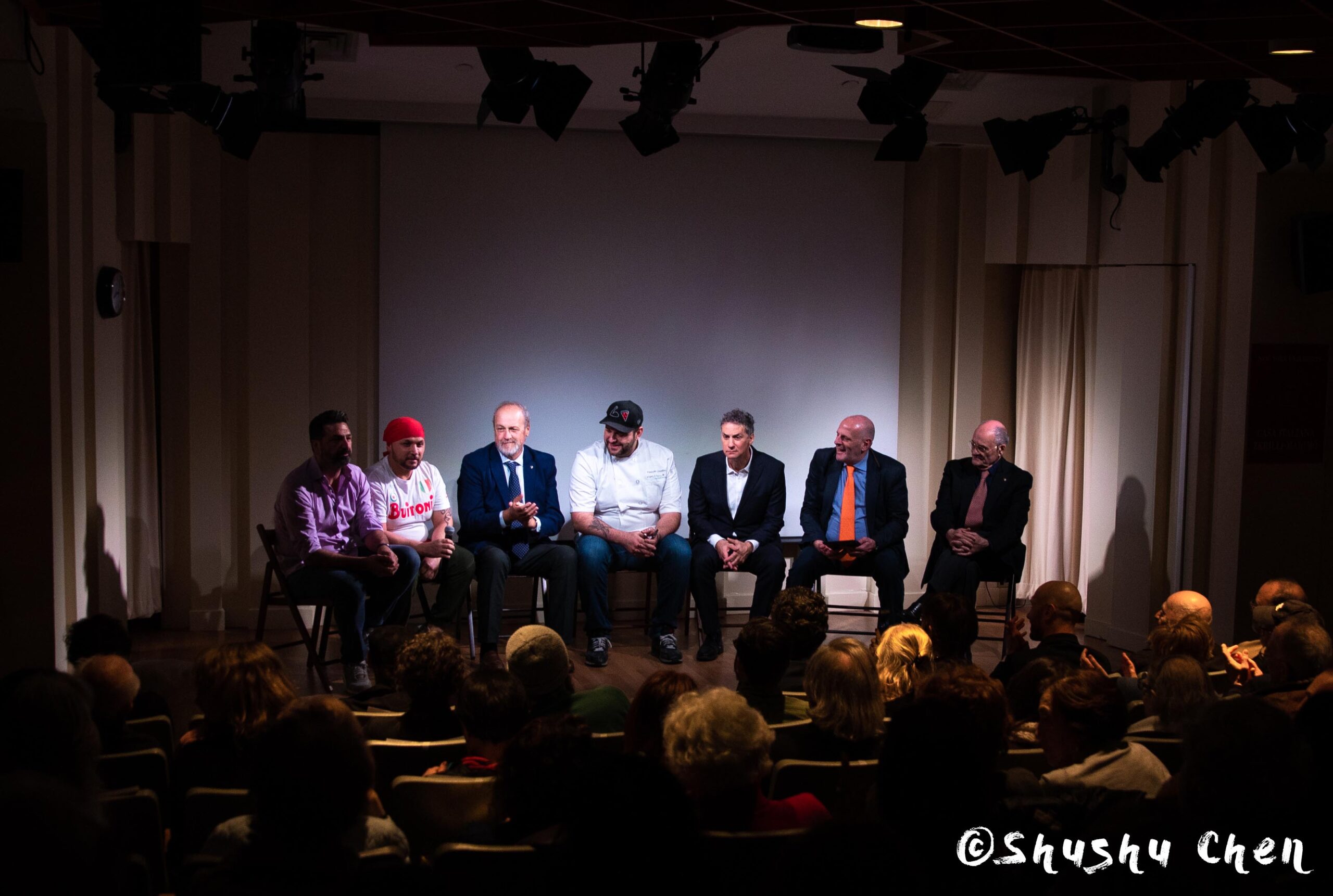 stefano-and-speaker-seated-on-stage-from-ny-premiere-screening-of-arrangiarsi-and-presentation-at-casa-italiana