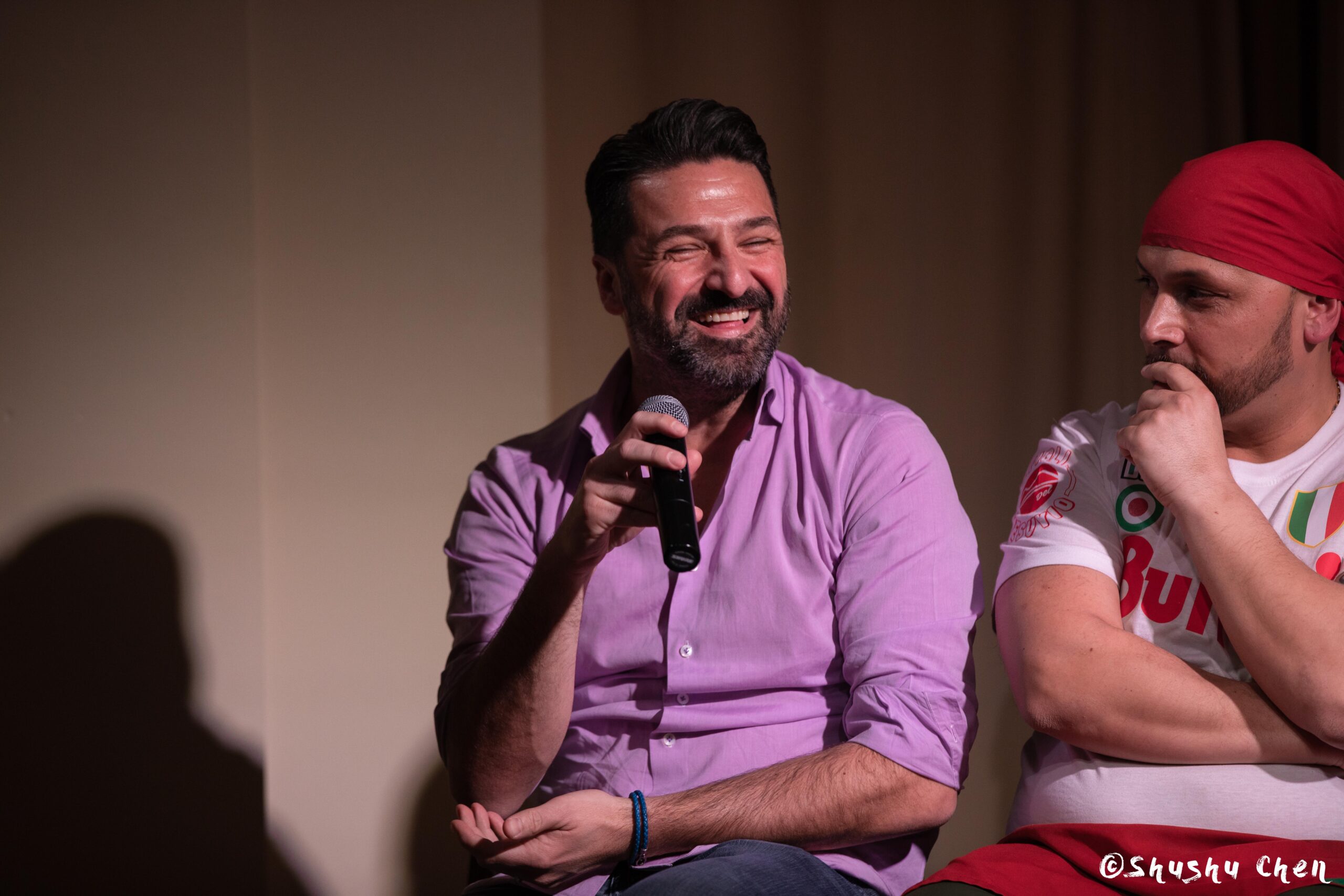 speaker-smiling-from-ny-premiere-screening-of-arrangiarsi-and-presentation-at-casa-italiana