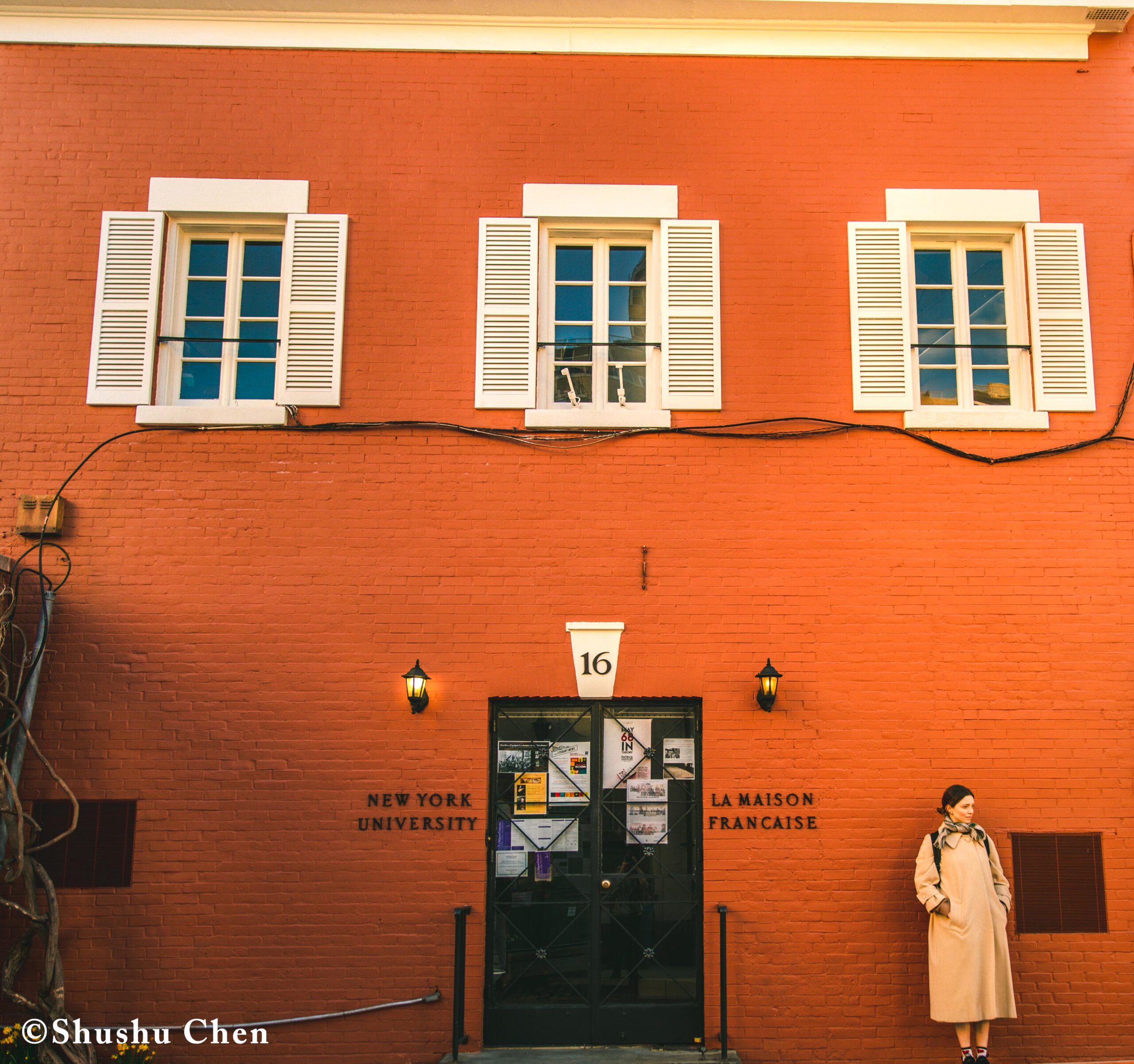 woman-standing-at-the-entrance-from-pen-world-voices-literary-mews-blurring-borders-at-nyu